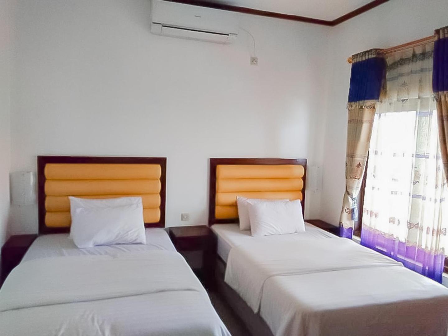 Twin Room - Photo 4