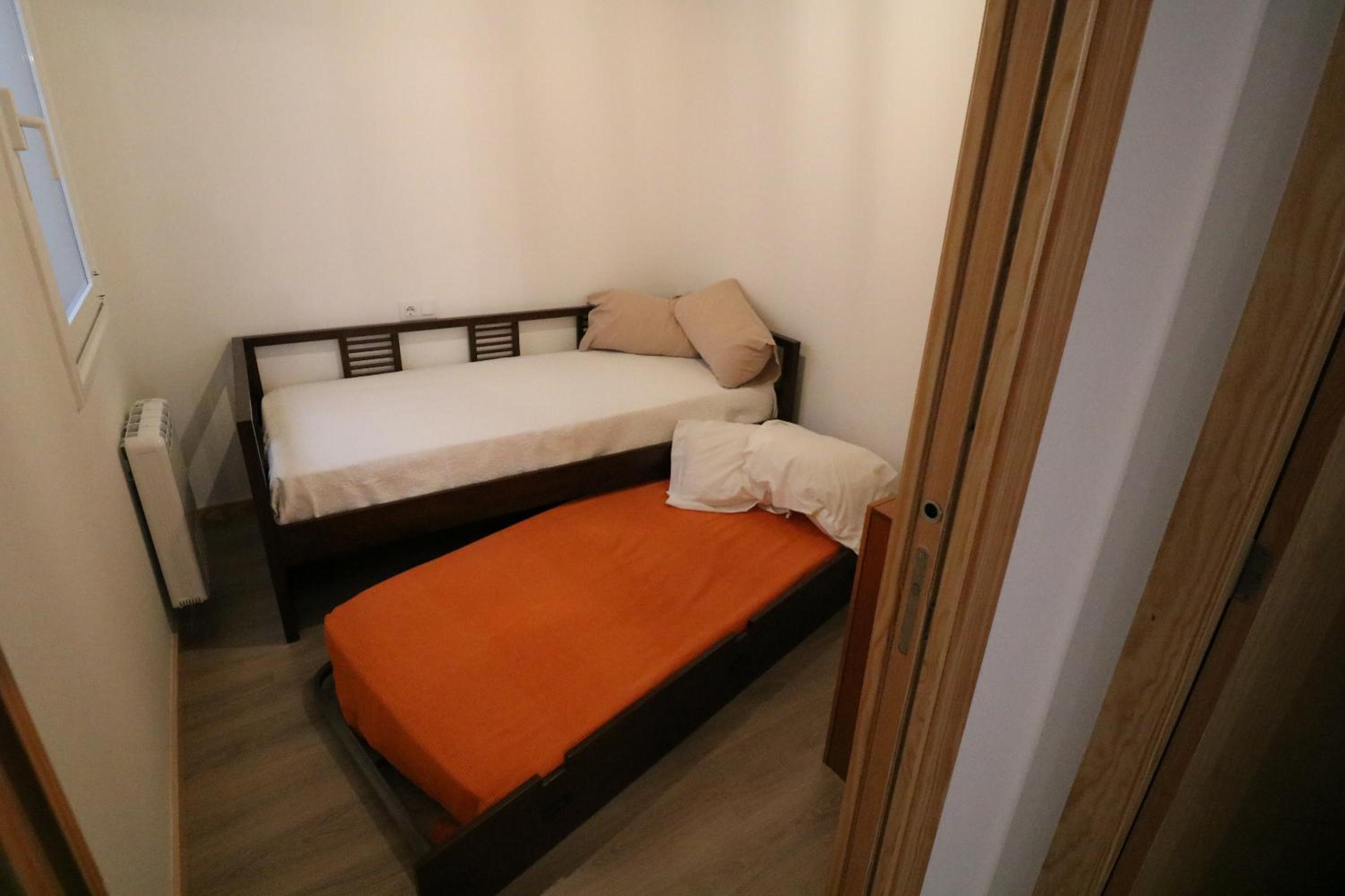 Three-Bedroom Apartment - Photo 32