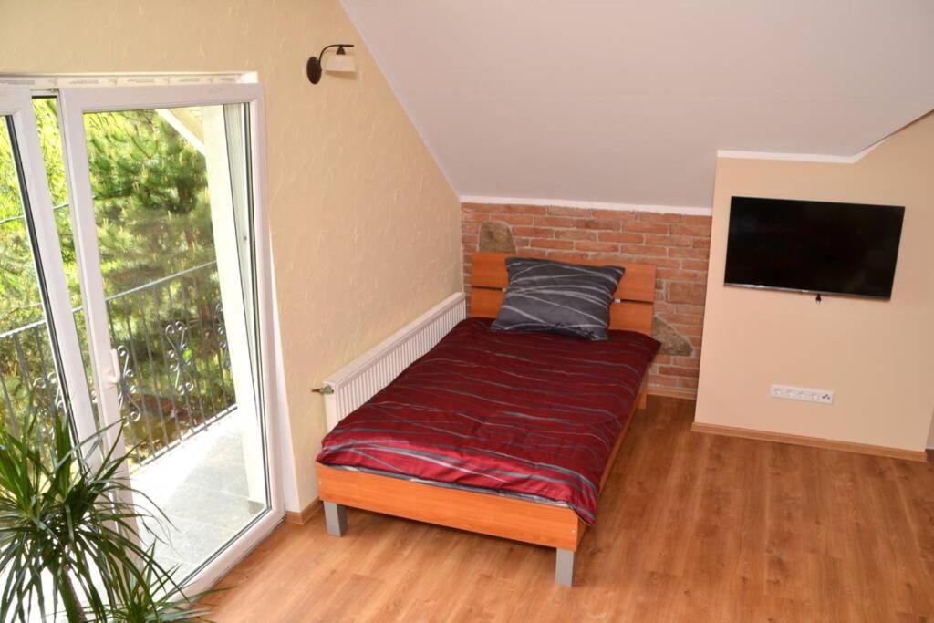 Three-Bedroom Apartment - Photo 5
