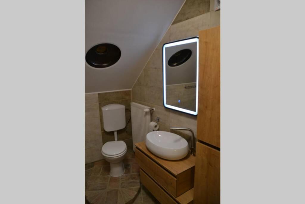 Three-Bedroom Apartment - Photo 12