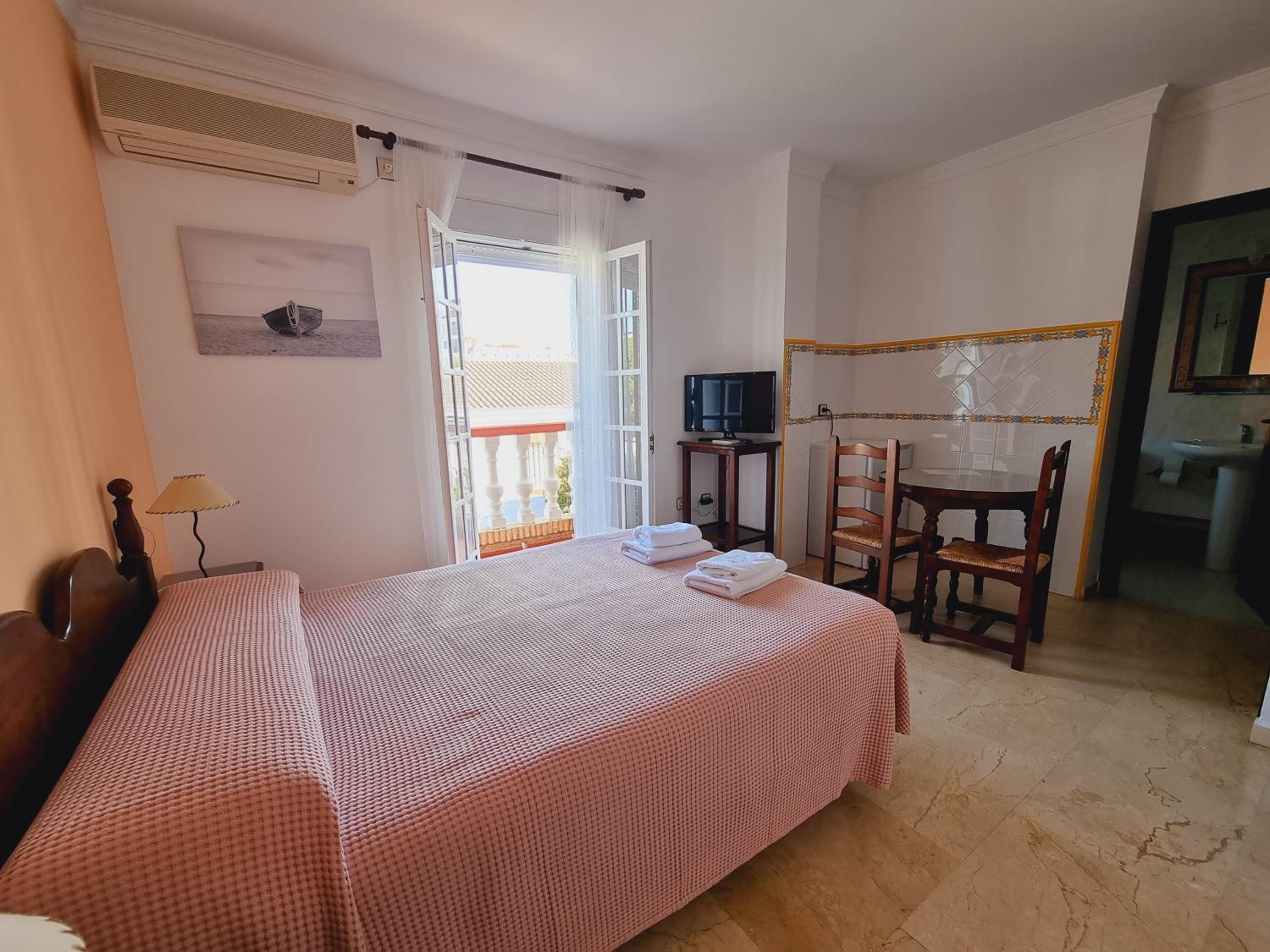 Habitación Triple con Balcón
