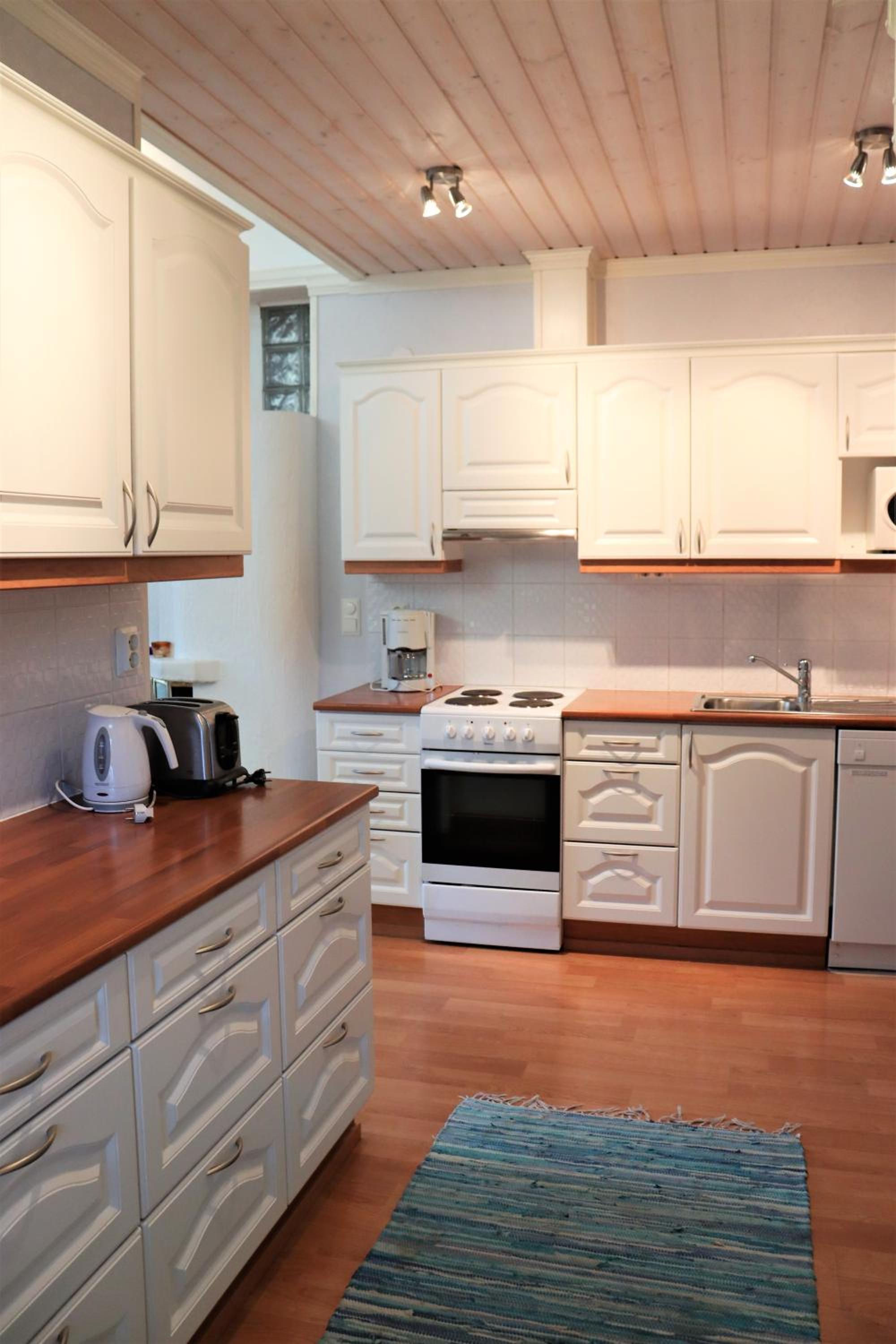 Three-Bedroom Apartment - Photo 2