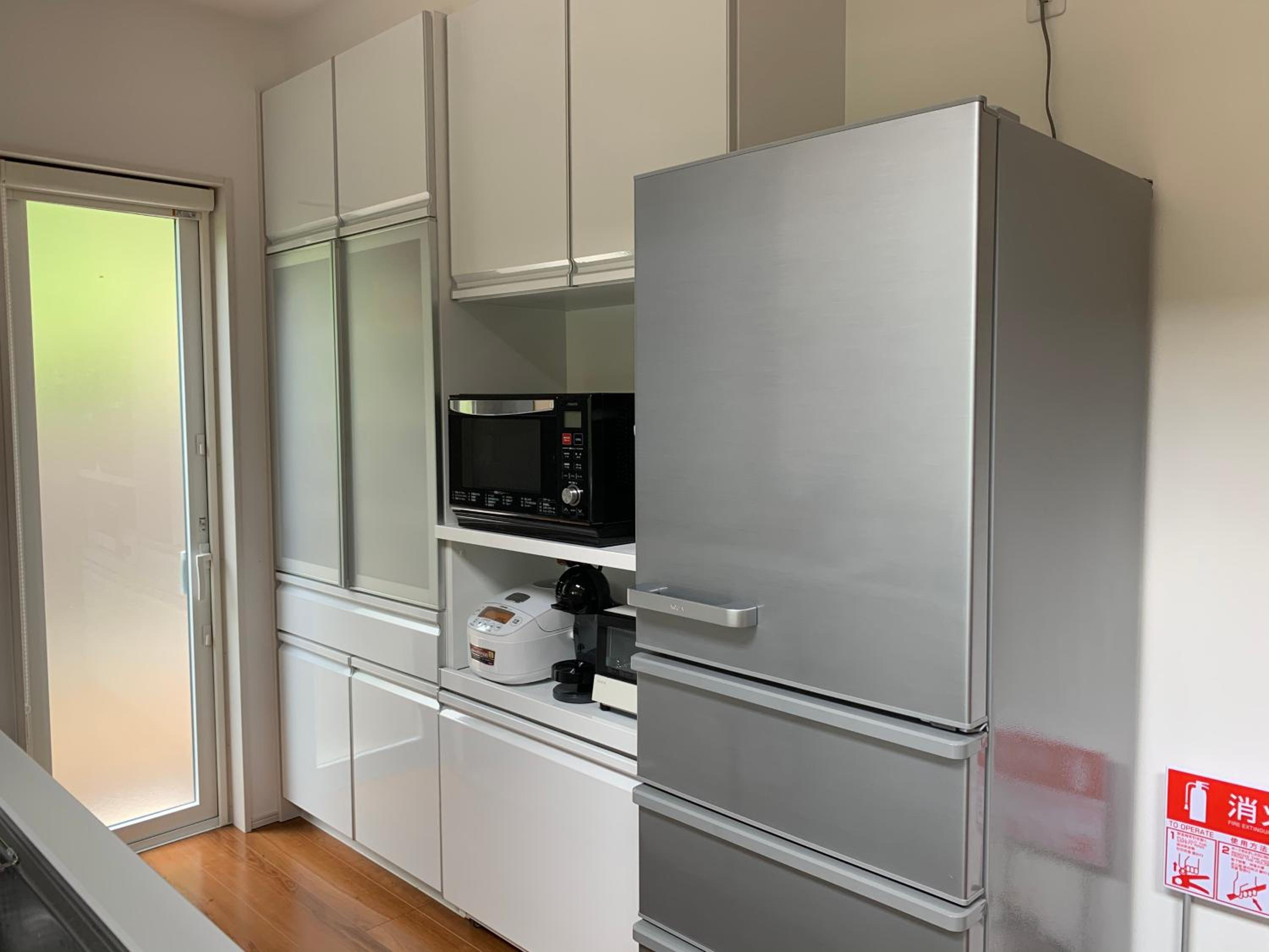 Three-Bedroom House - Photo 43