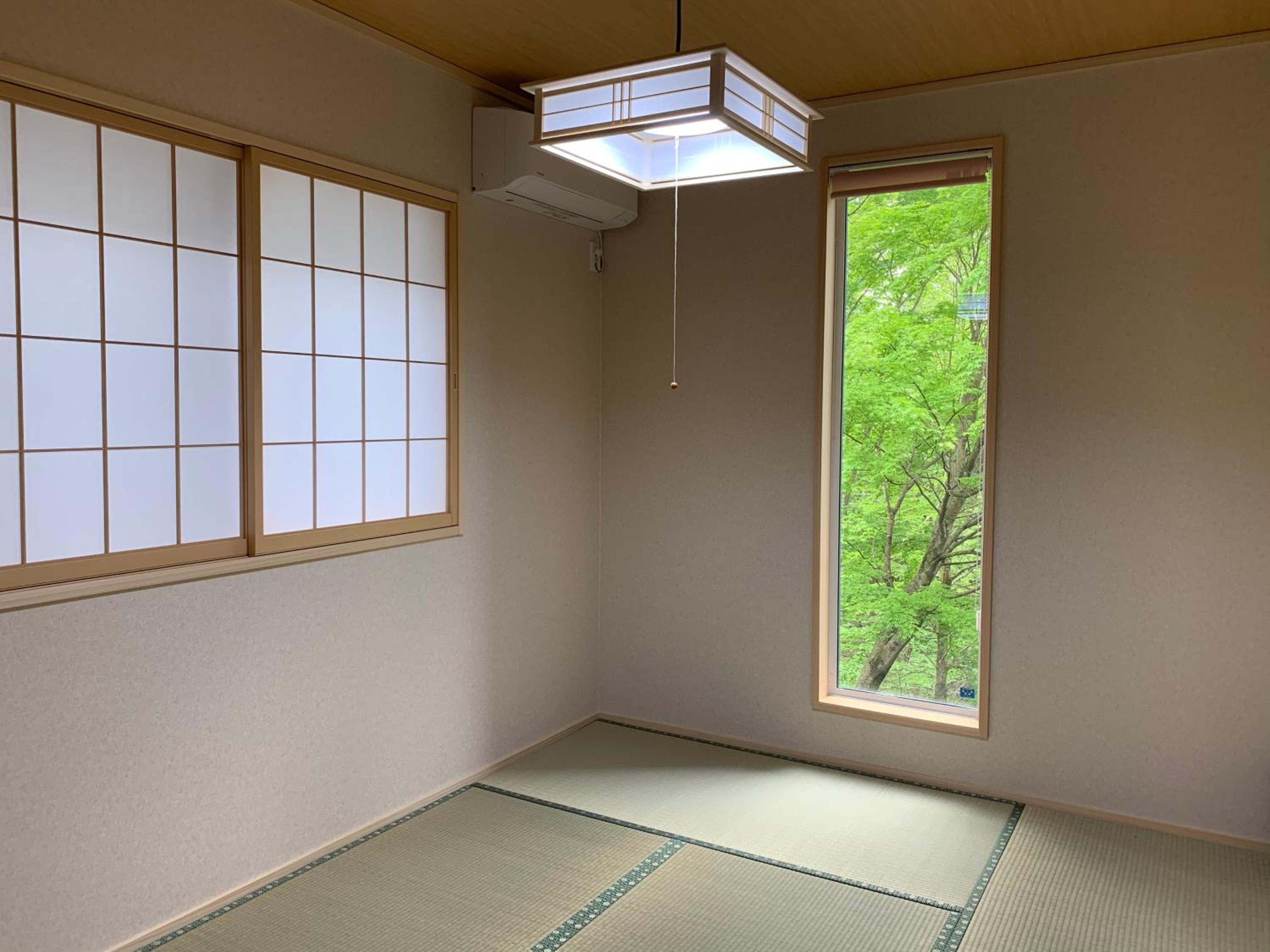 Three-Bedroom House - Photo 28