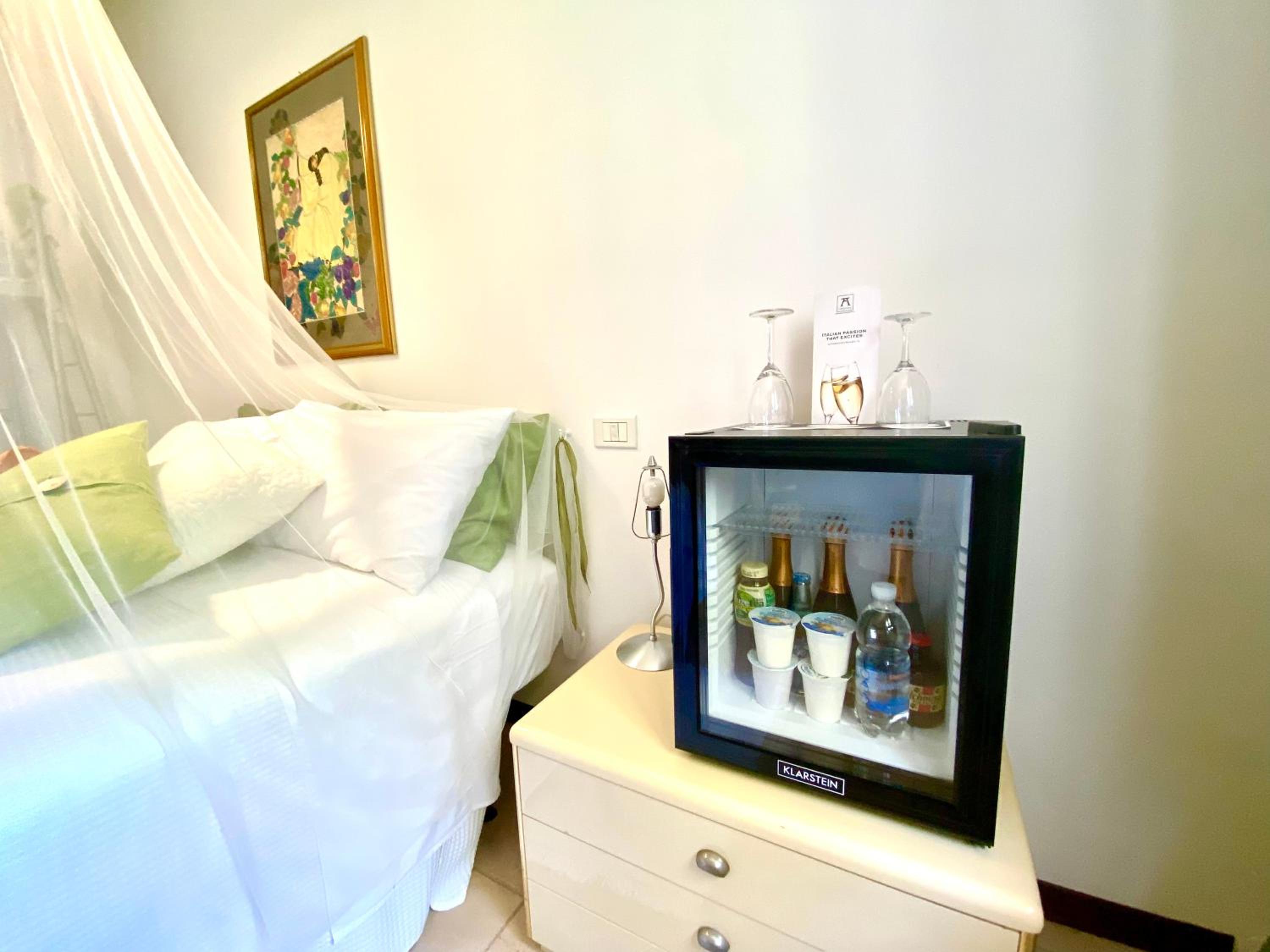 Deluxe Quadruple Room - Photo 14