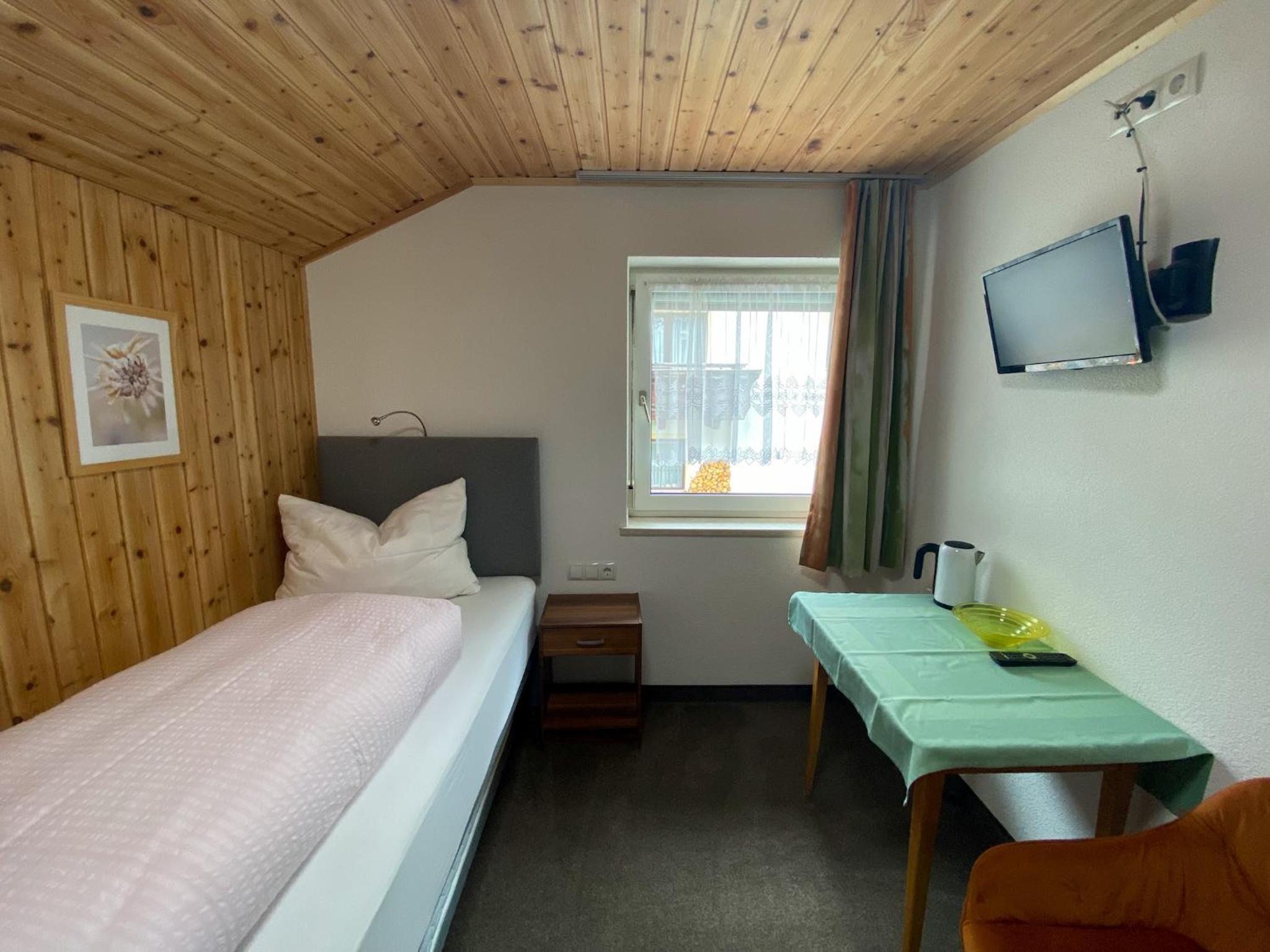 Single Room with Shared Shower and Toilet