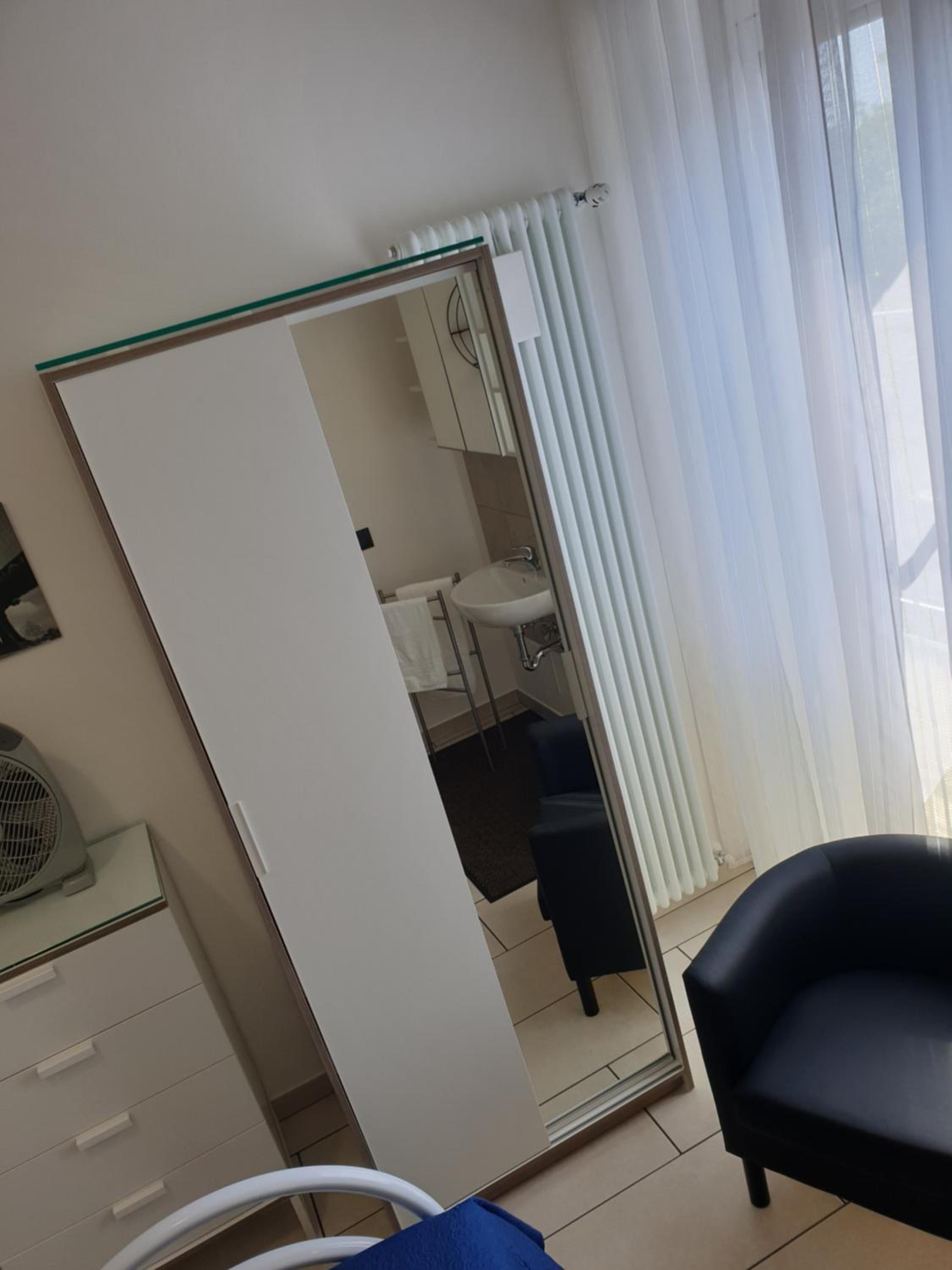 Three-Bedroom Apartment - Photo 26