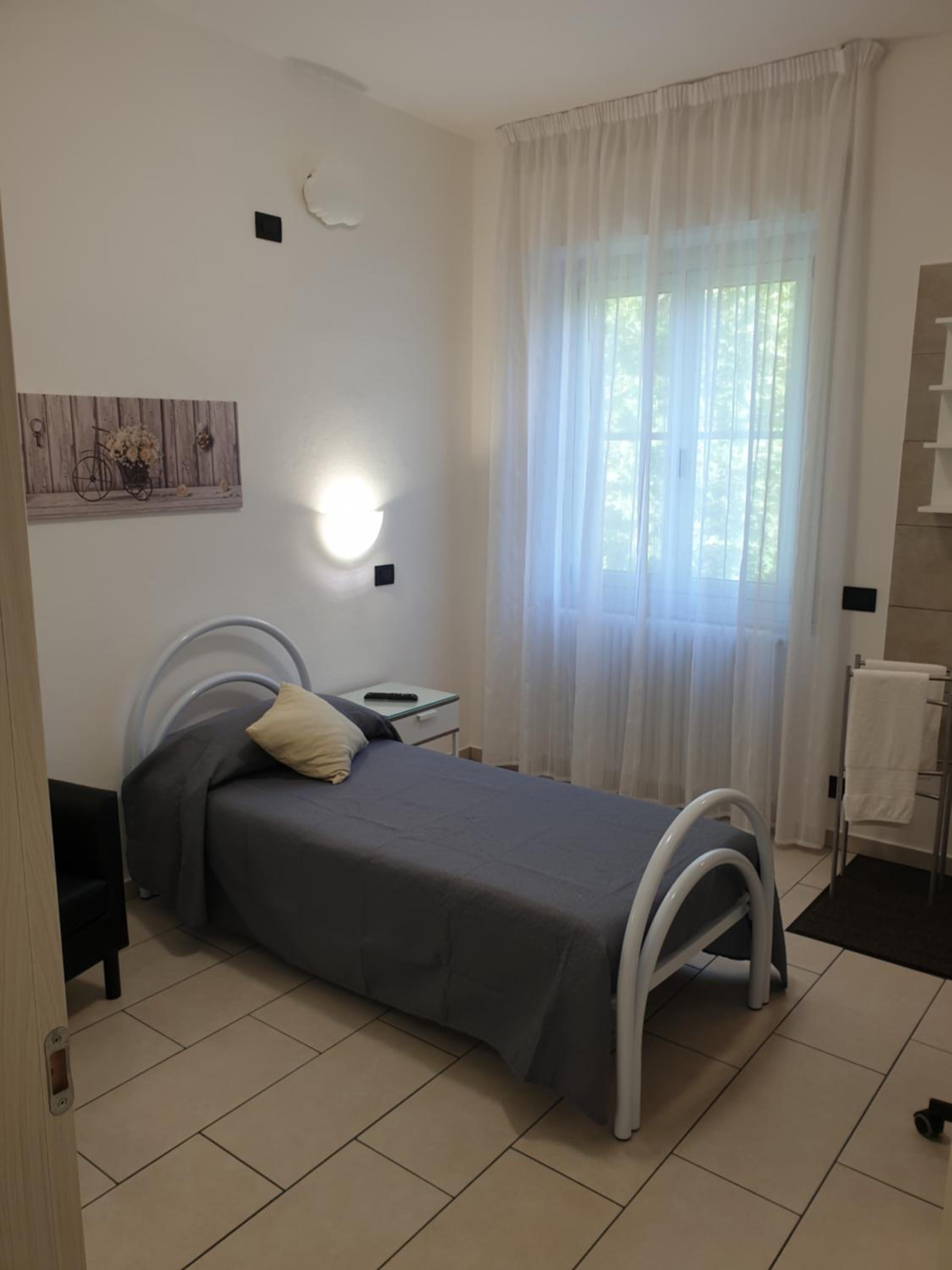 Three-Bedroom Apartment - Photo 34