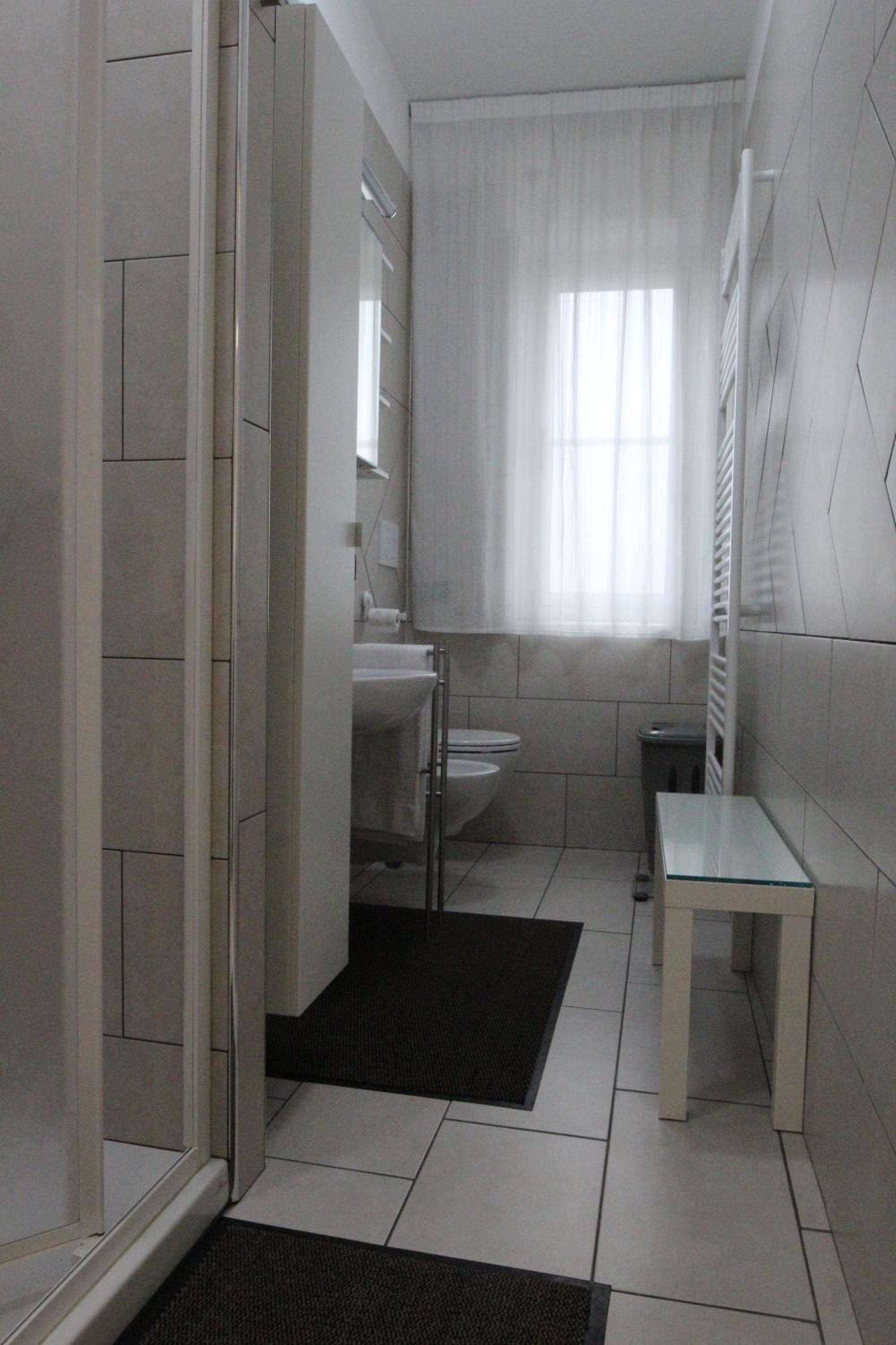 Three-Bedroom Apartment - Photo 15