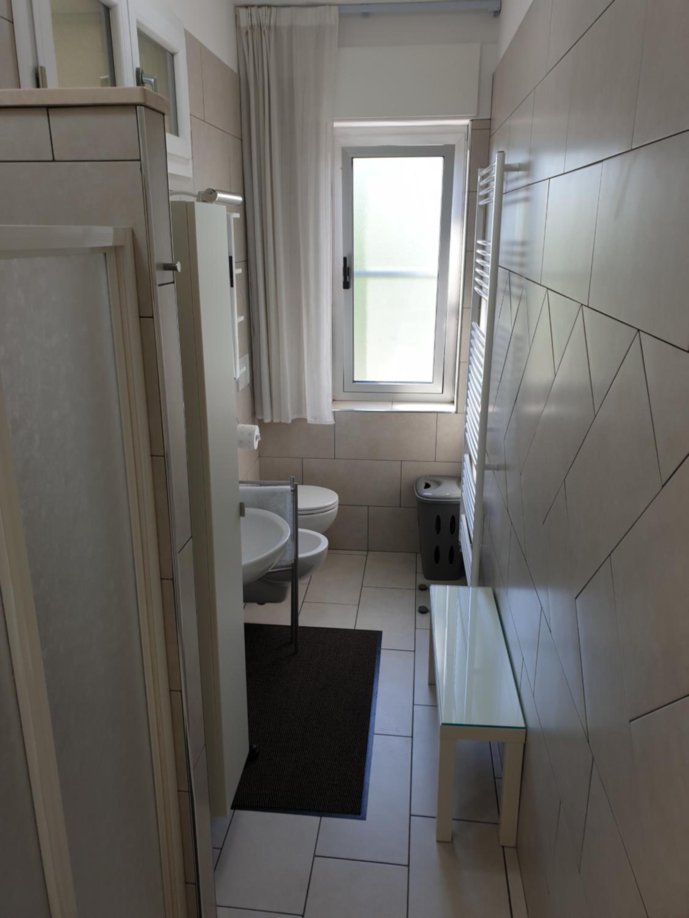 Three-Bedroom Apartment - Photo 11