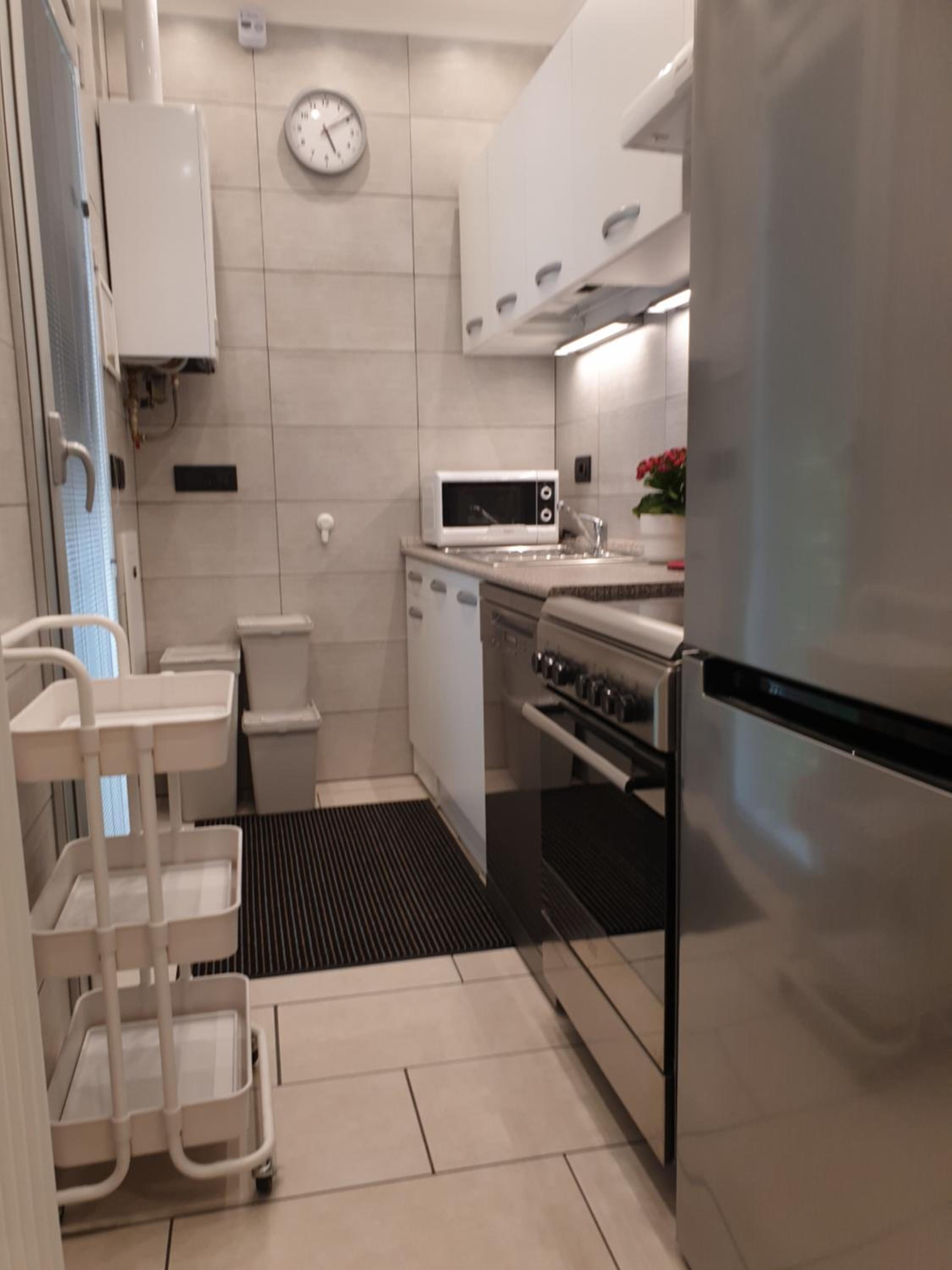 Three-Bedroom Apartment - Photo 12