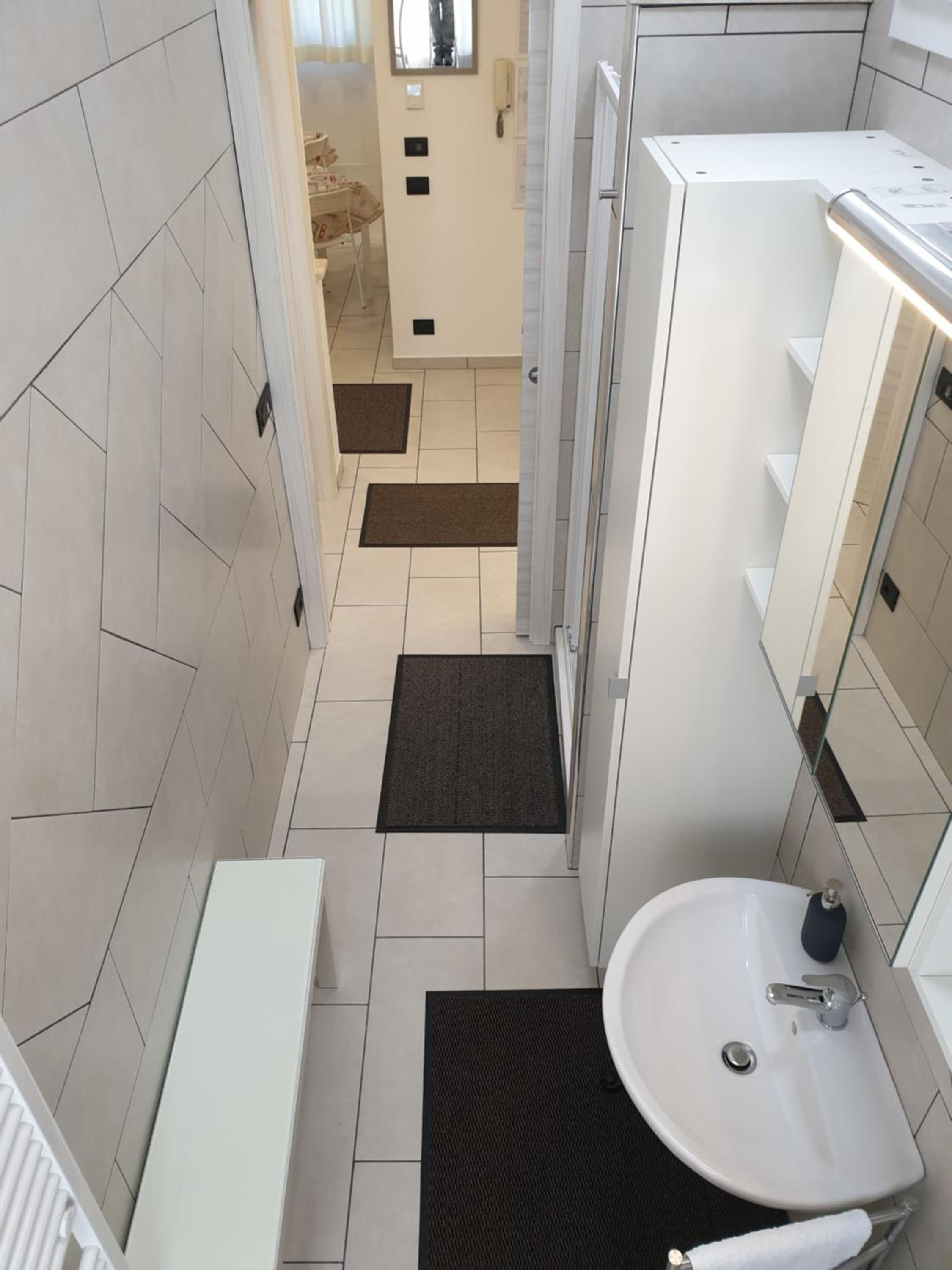 Three-Bedroom Apartment - Photo 18