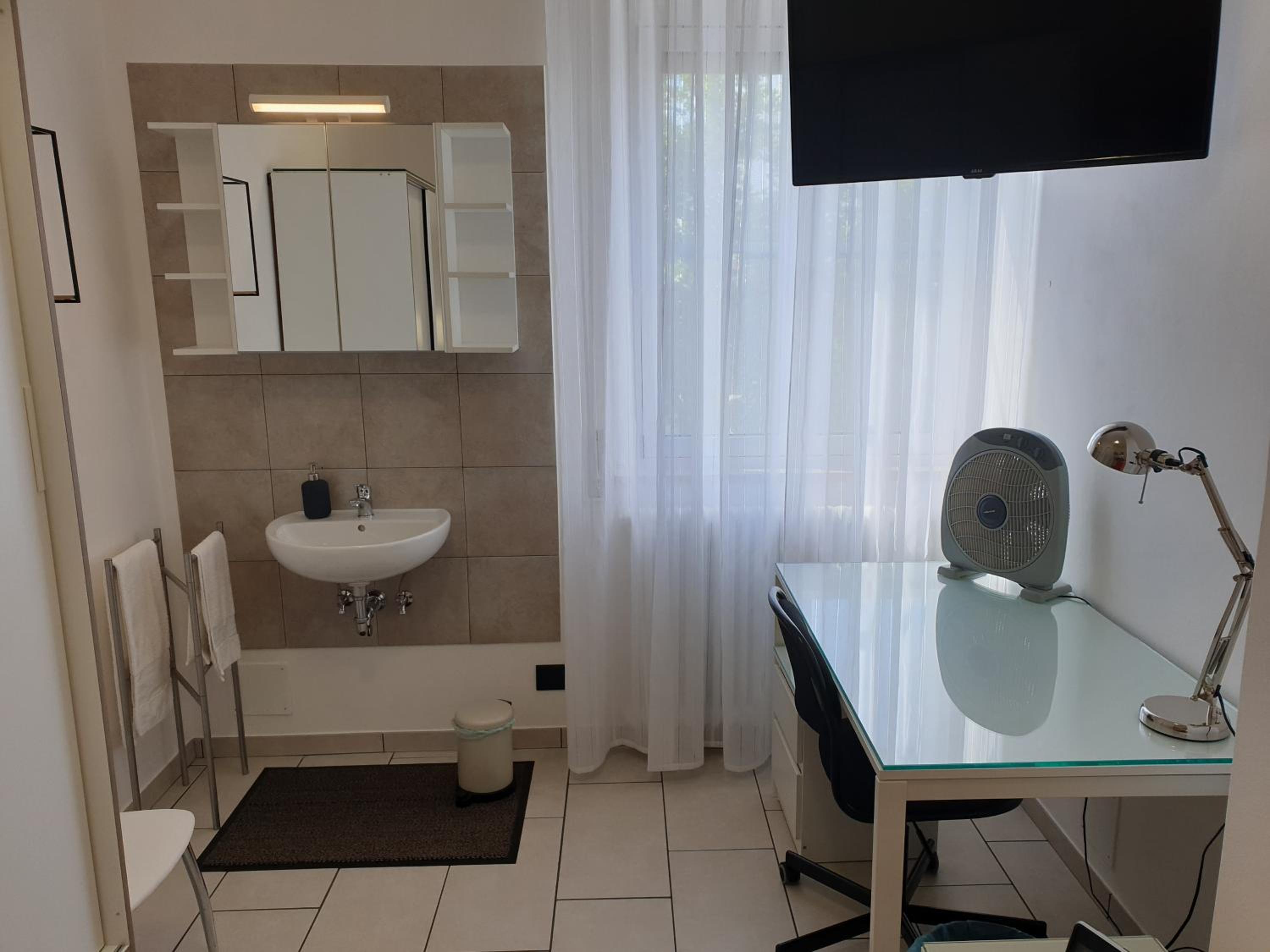 Three-Bedroom Apartment - Photo 30