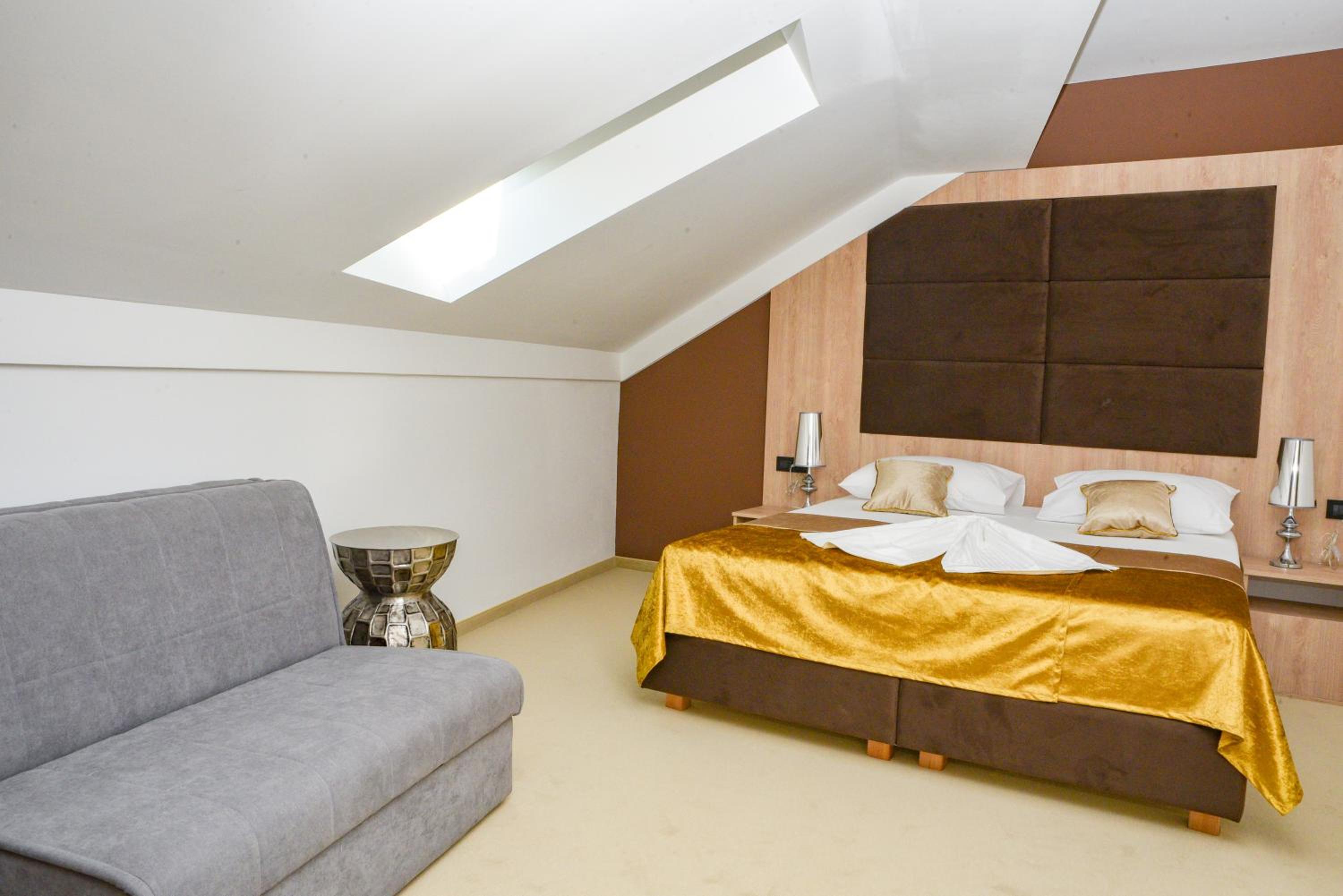Camera Matrimoniale Deluxe con 1 Letto Supplementare