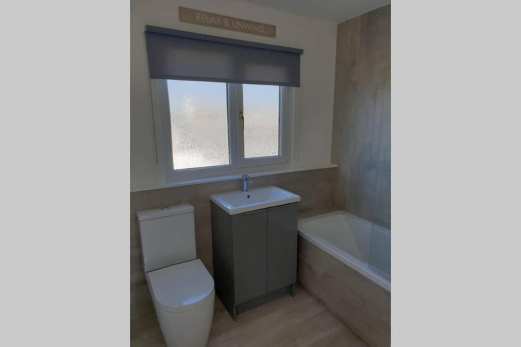 Three-Bedroom House photo 2