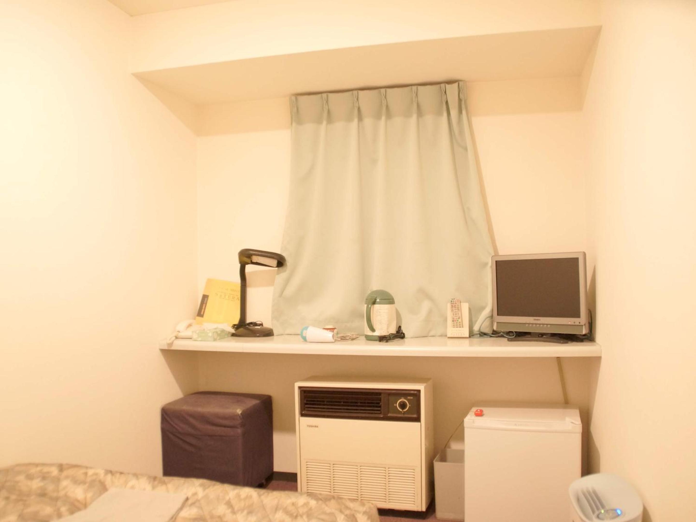 Economy Single Room - Smoking photo 3