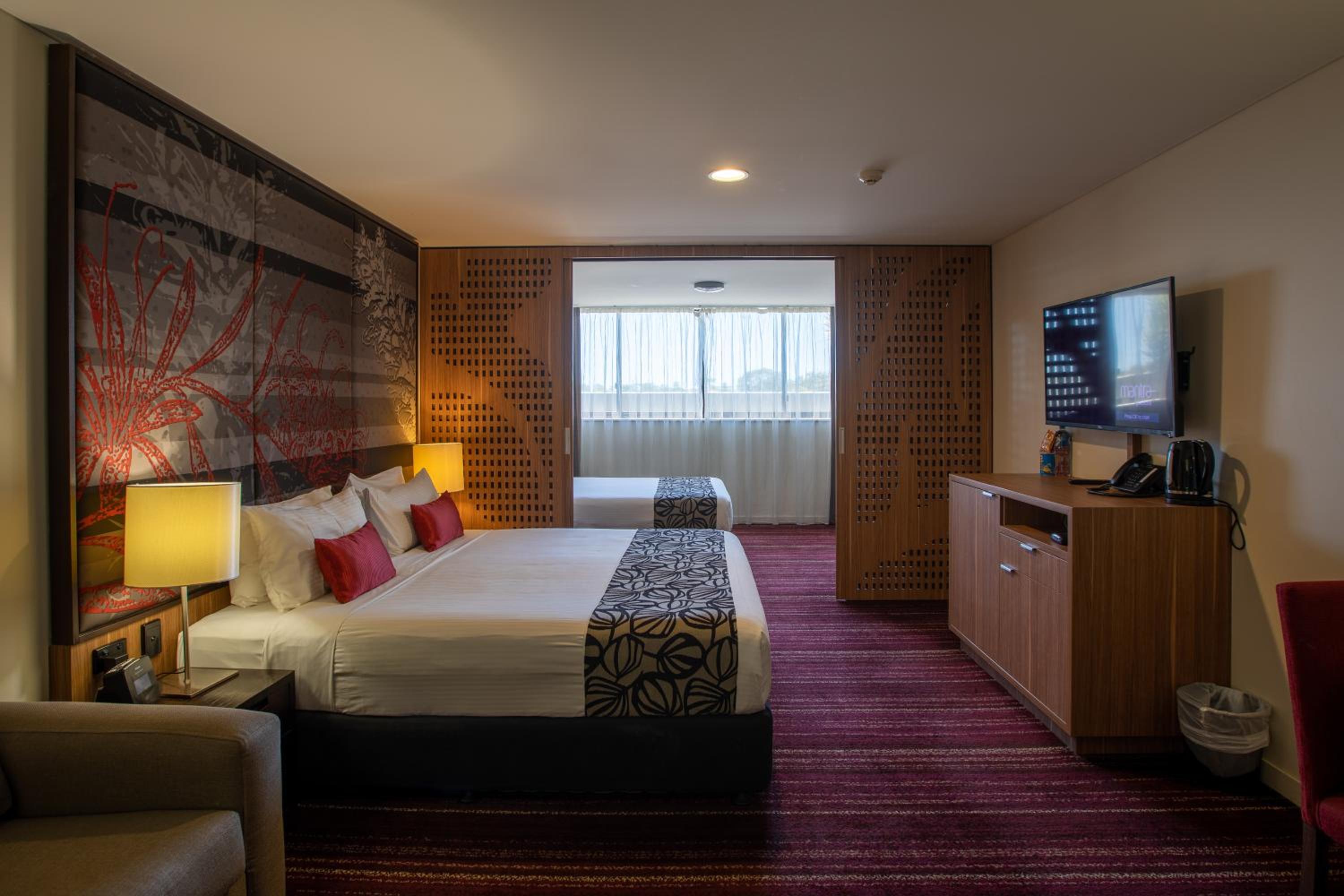 Family Suite with One King Bed and One Queen Bed photo 1