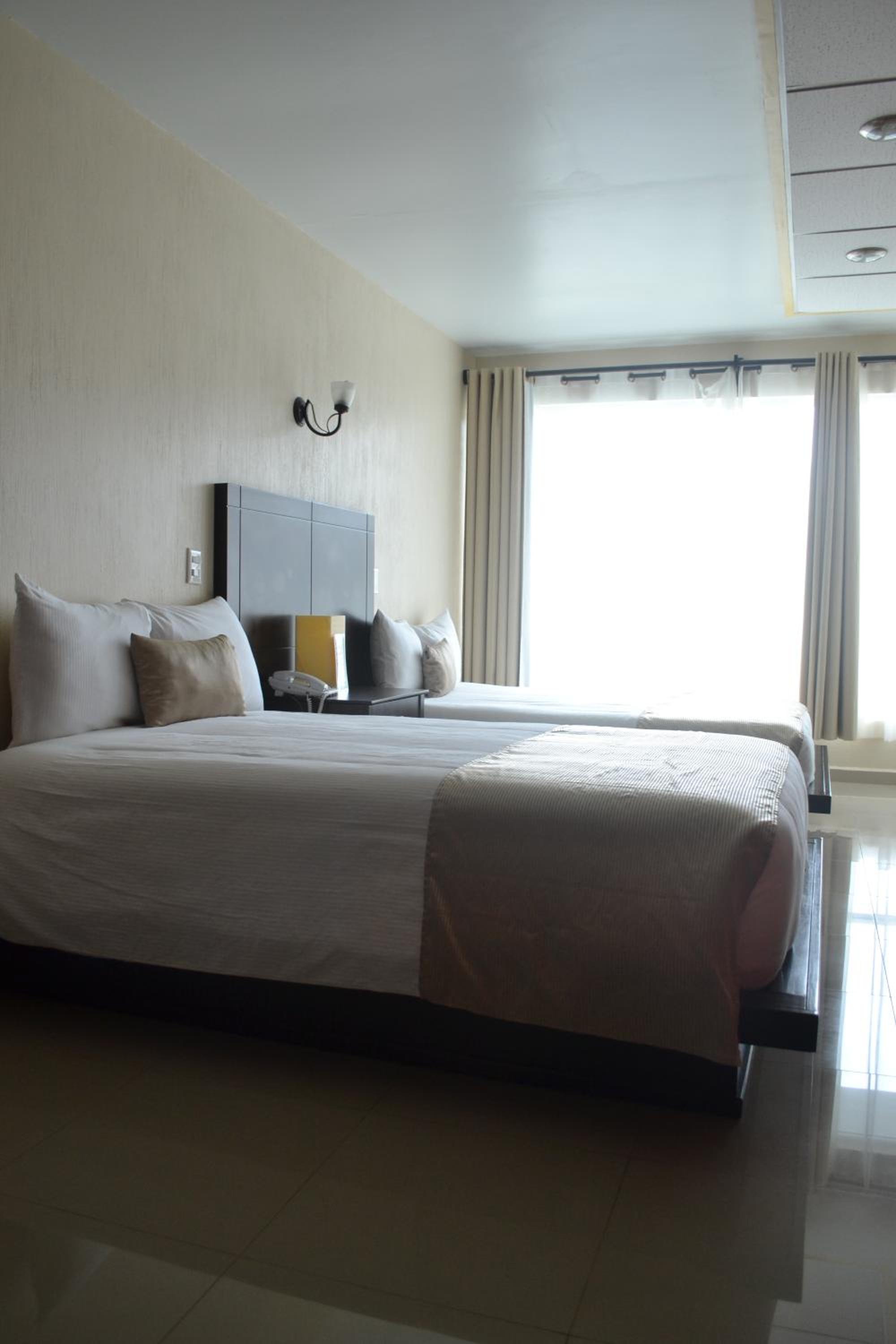 Double Room with Two Double Beds photo 3