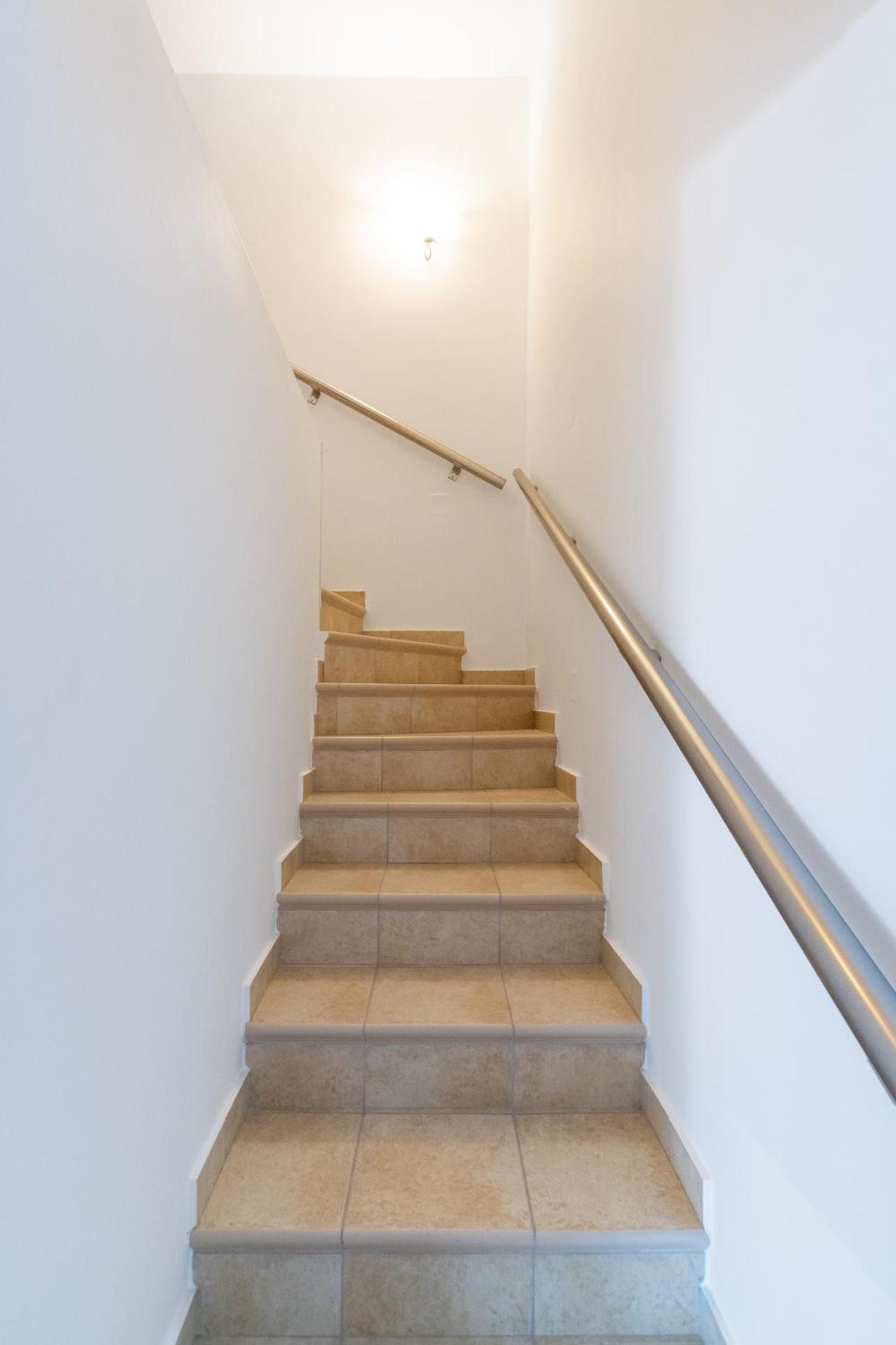 Three-Bedroom House - Photo 21