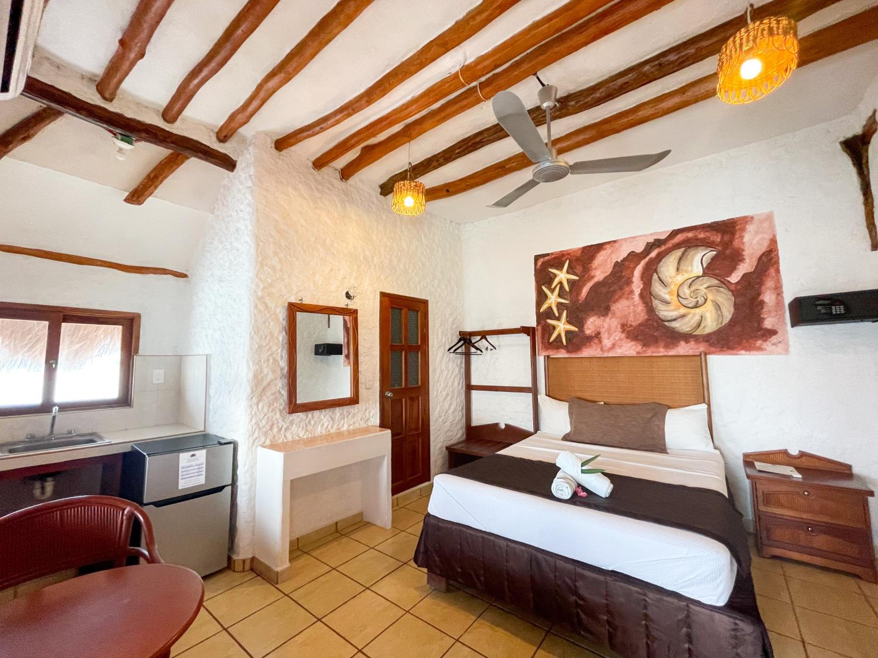 Quarto Queen à beira-mar