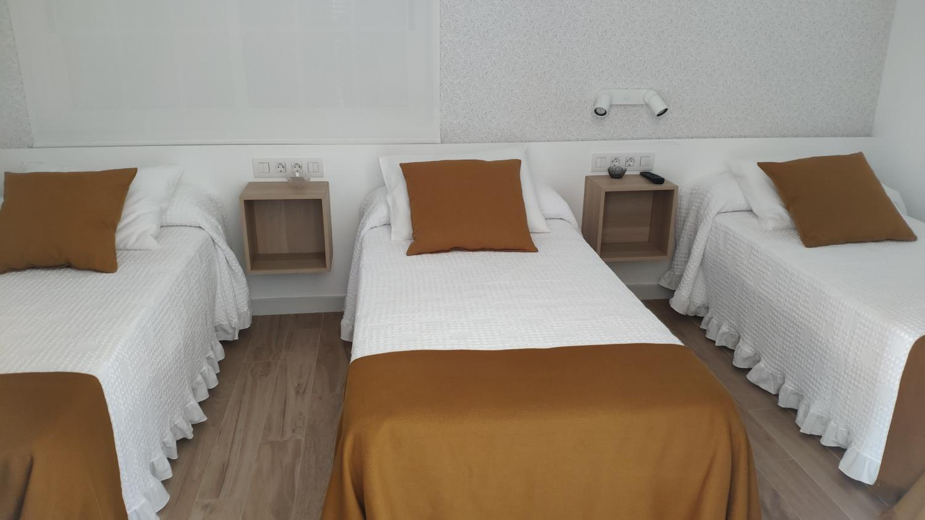Habitación Triple Superior con Baño Privado