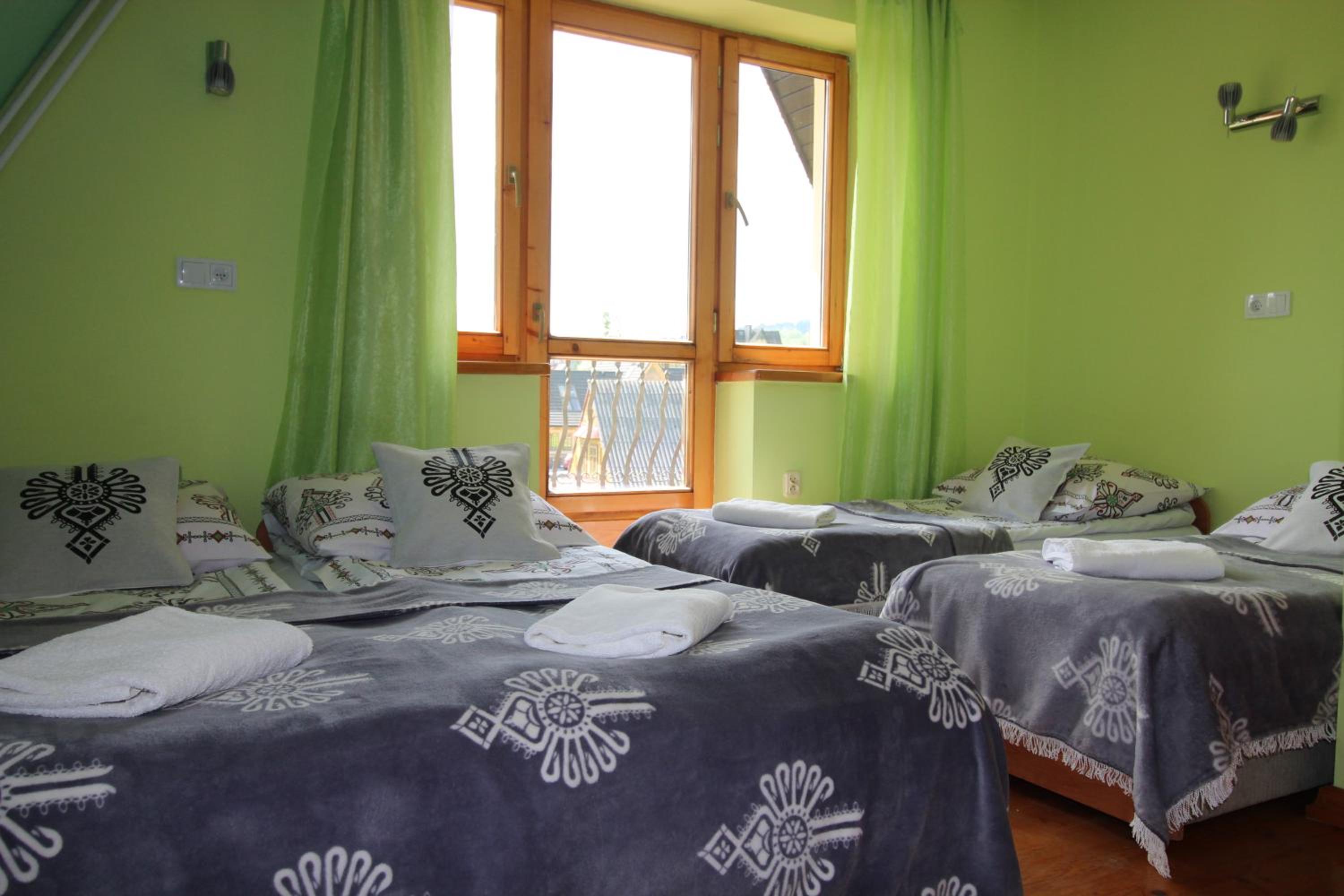 Quadruple Room with Balcony - Photo 2