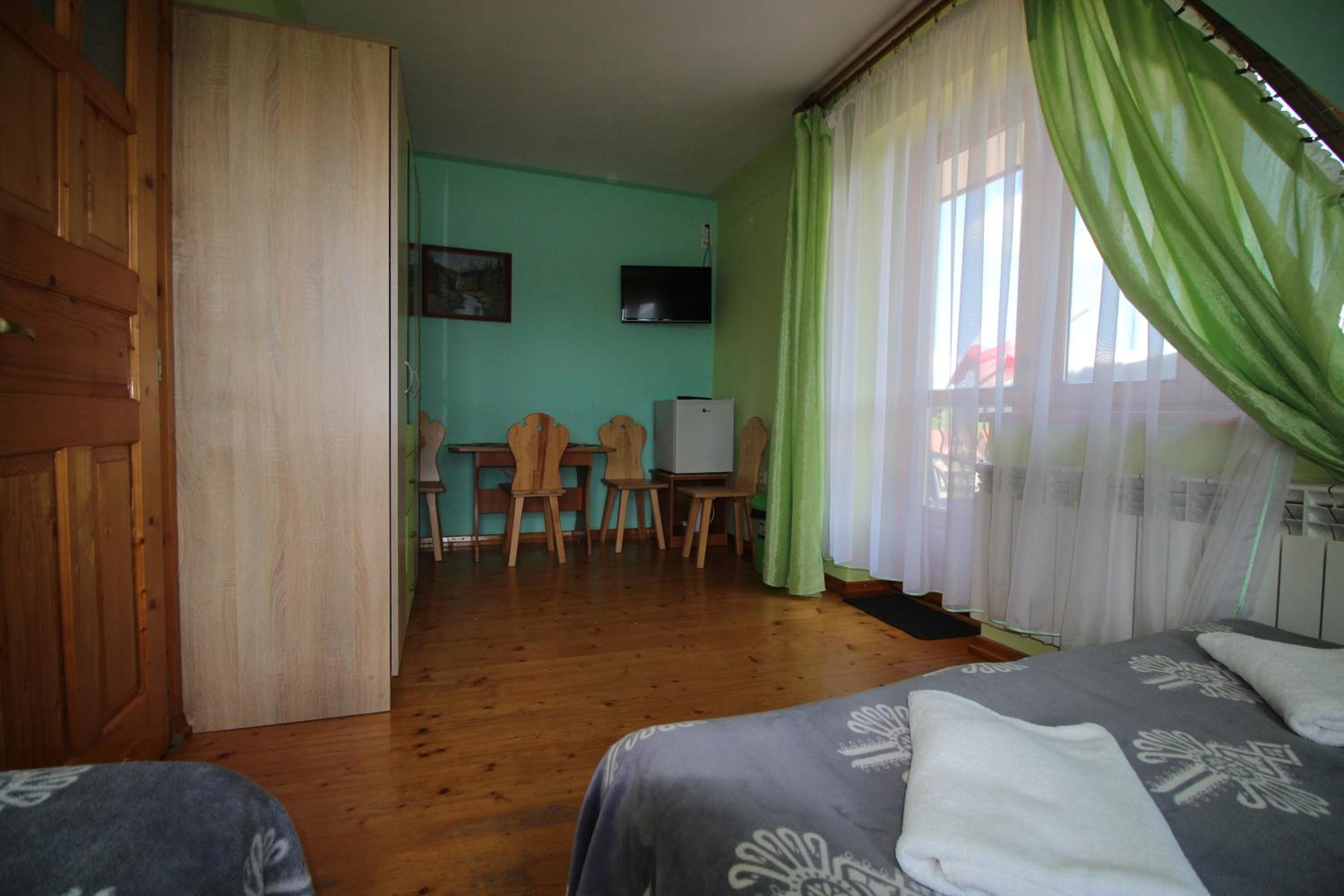 Quadruple Room with Balcony - Photo 12