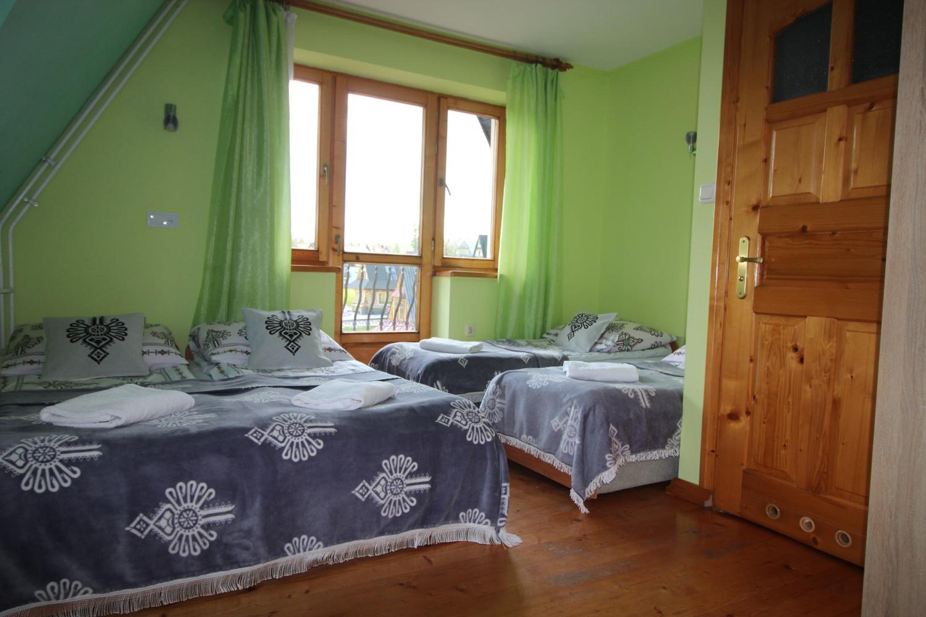 Quadruple Room with Balcony - Photo 1