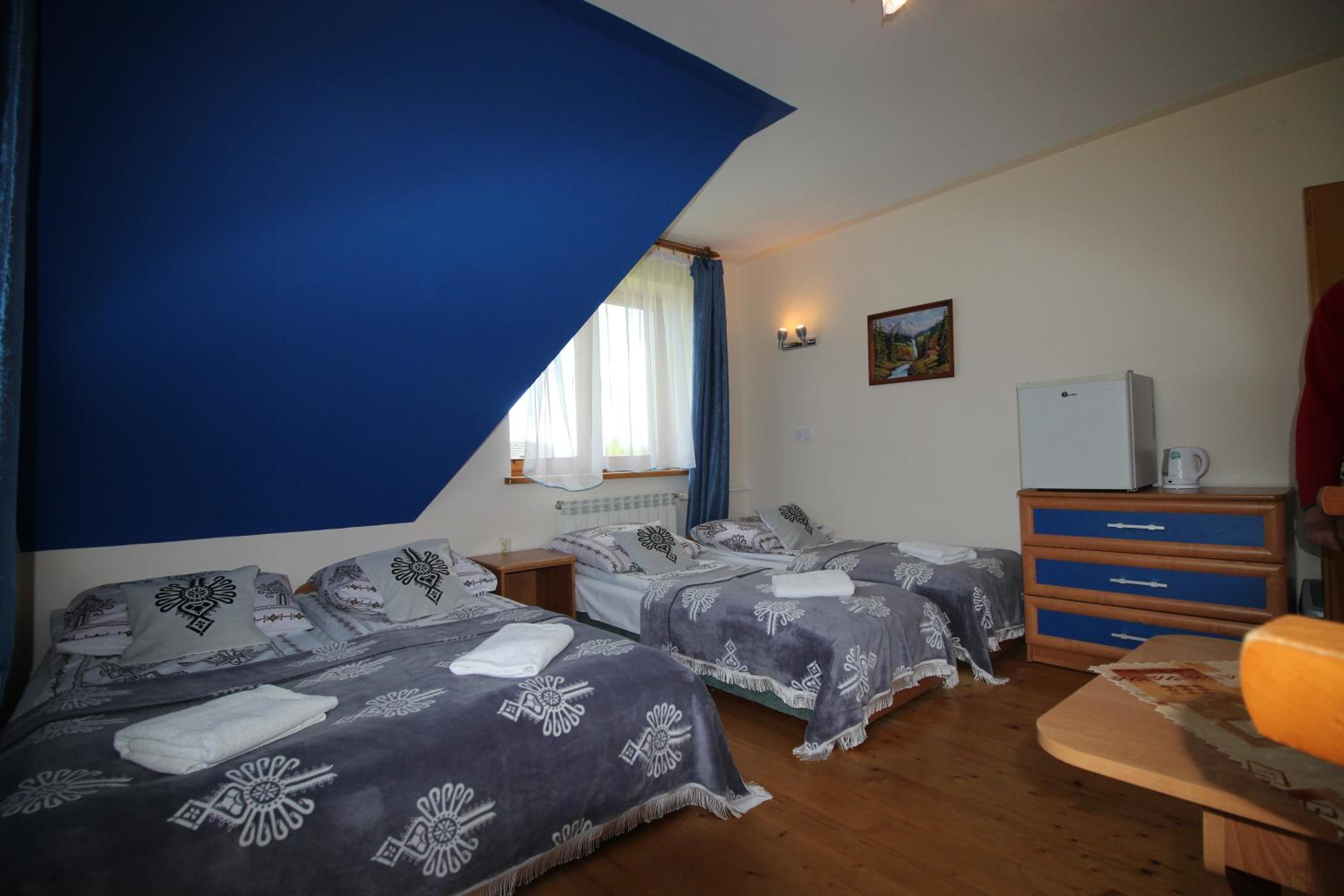 Economy Quadruple Room - Photo 6