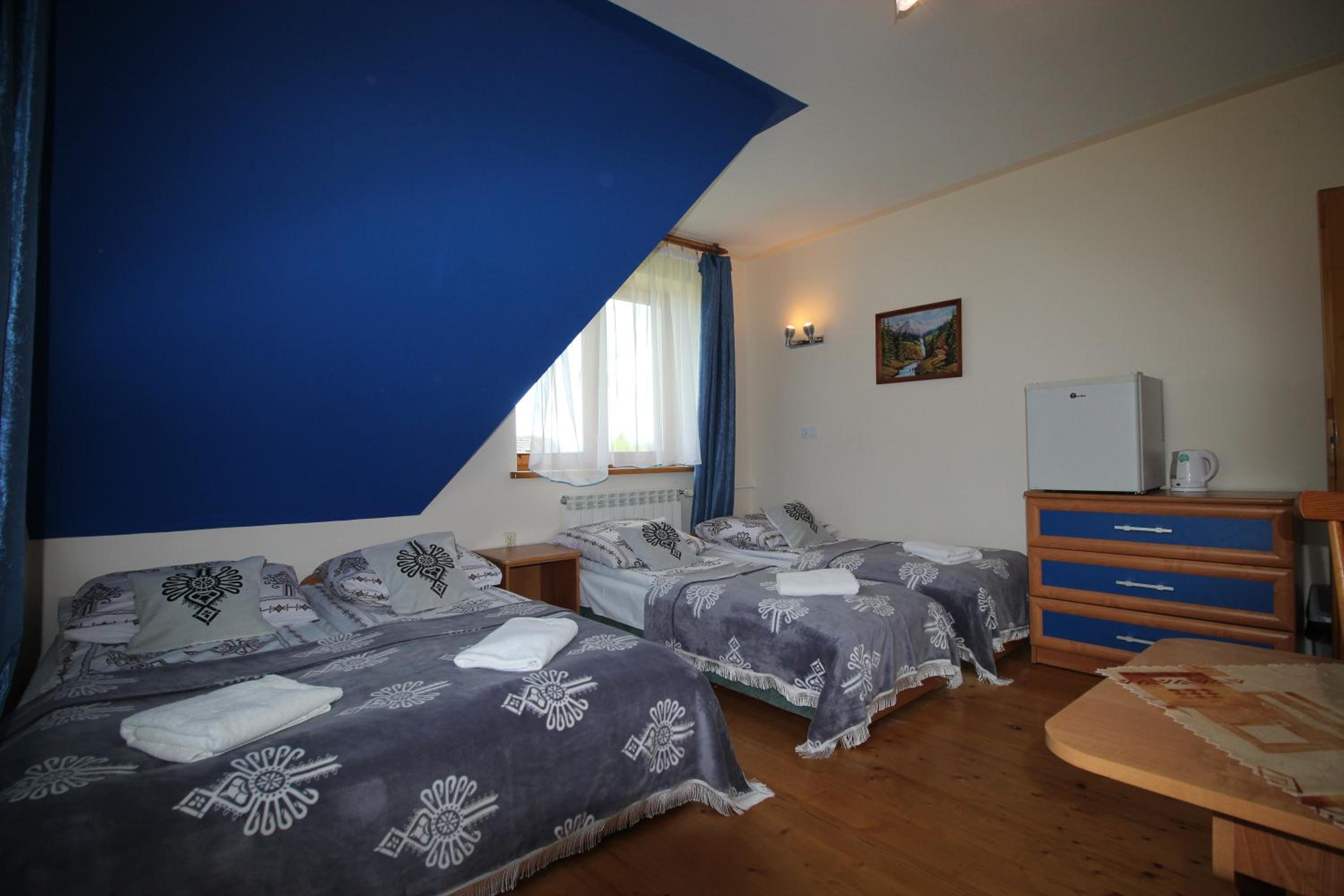 Economy Quadruple Room - Photo 7