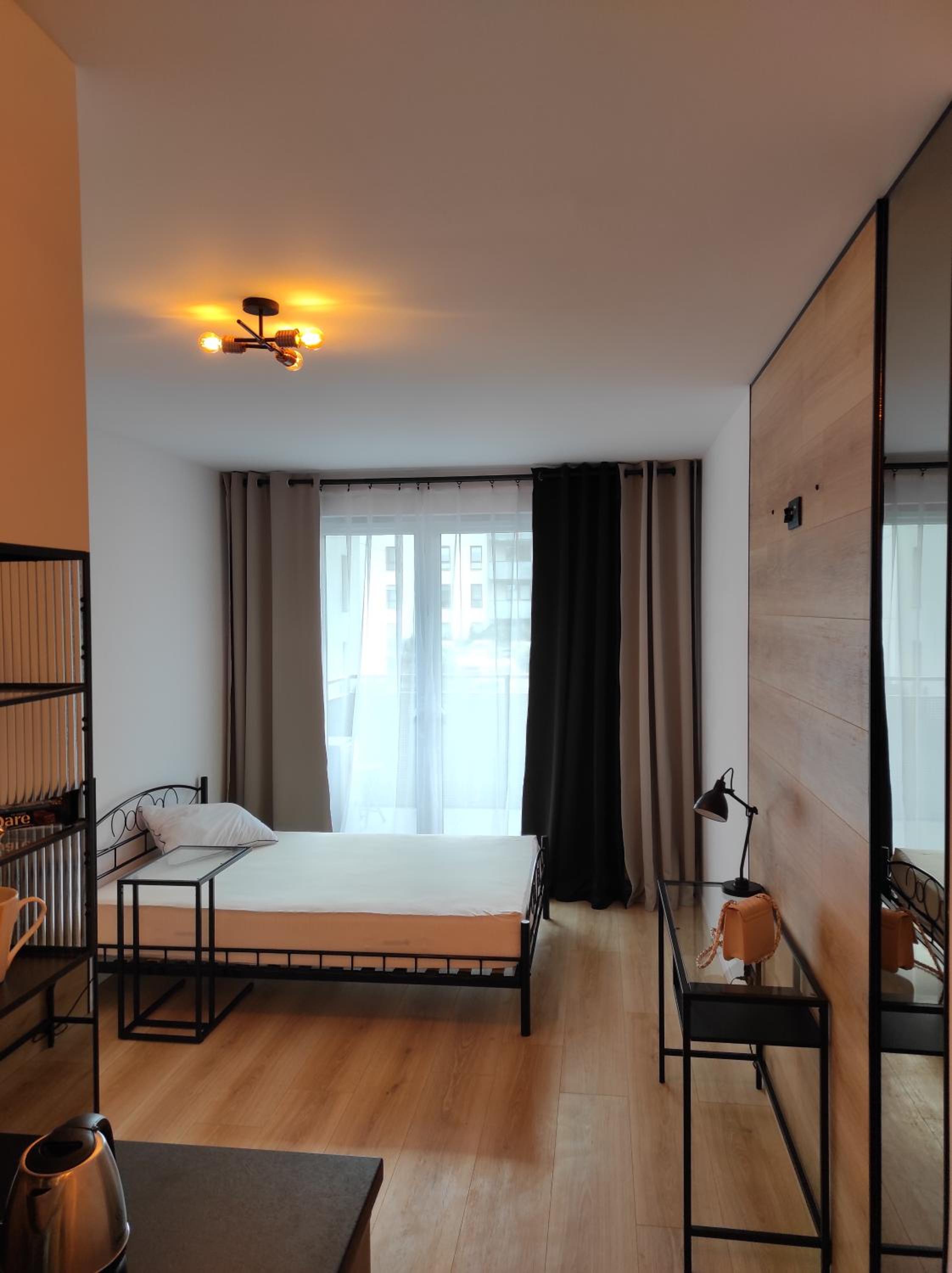 Apartment with Balcony - Photo 3