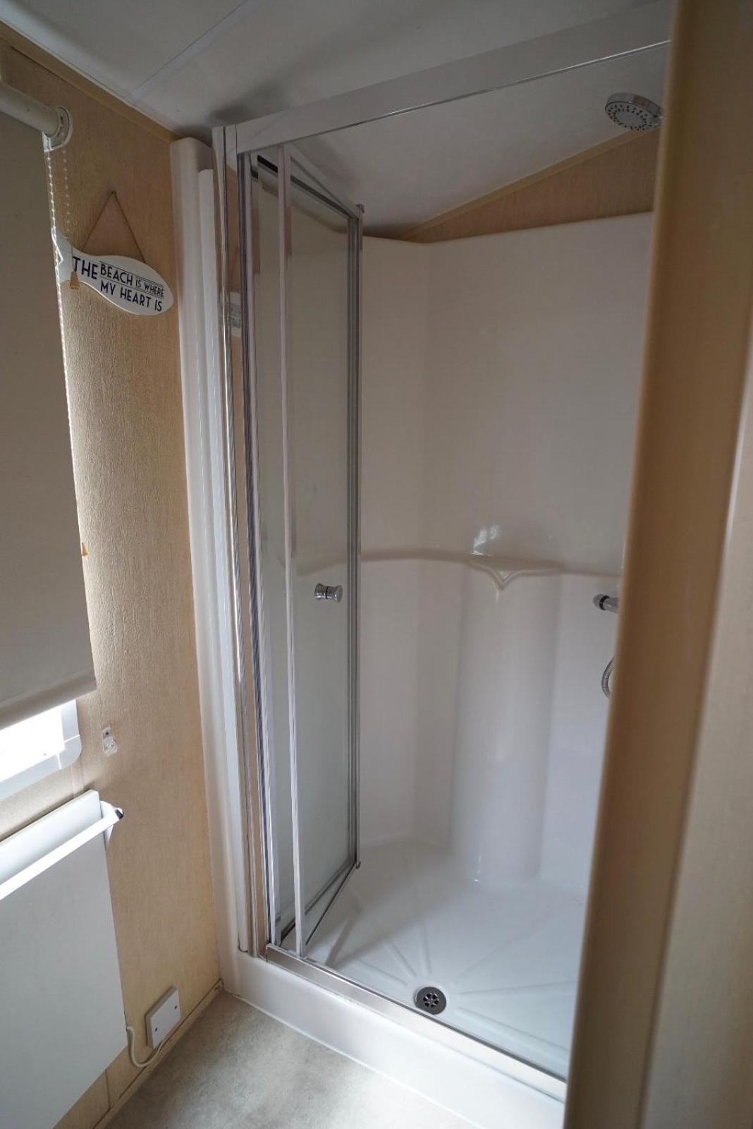 Three-Bedroom House - Photo 26