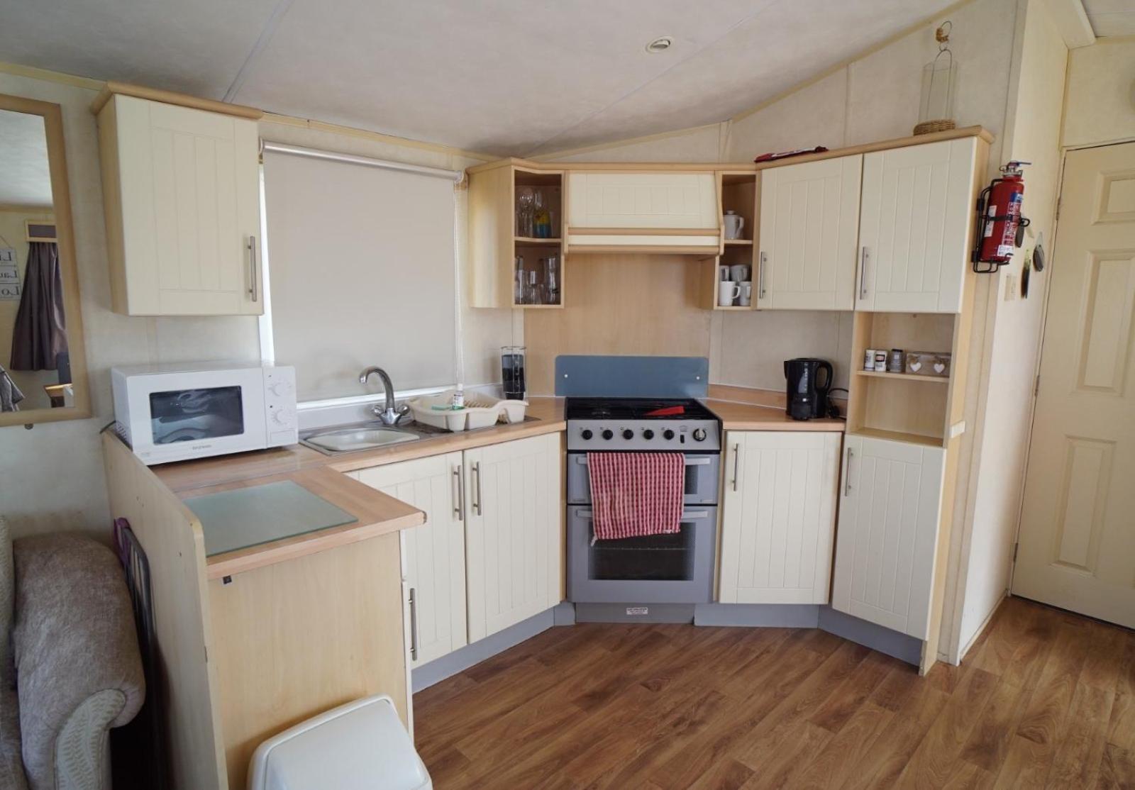 Three-Bedroom House - Photo 20