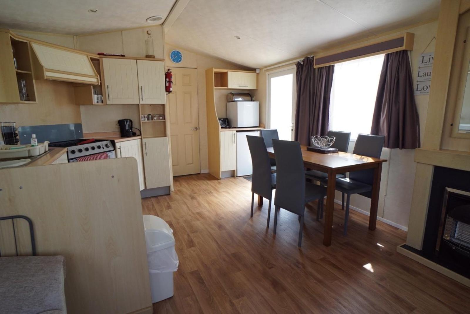 Three-Bedroom House - Photo 22