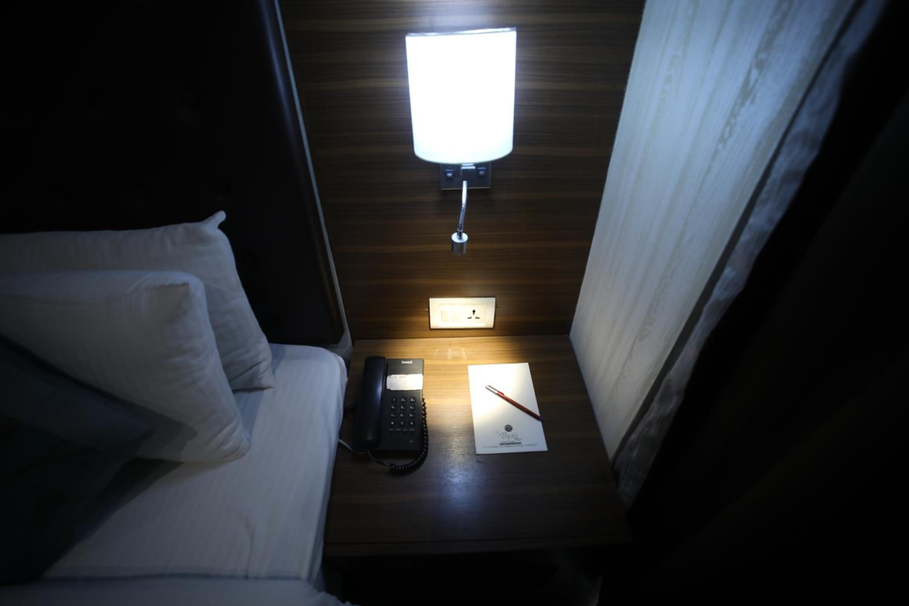 Super Deluxe Room King Bed - Photo 10