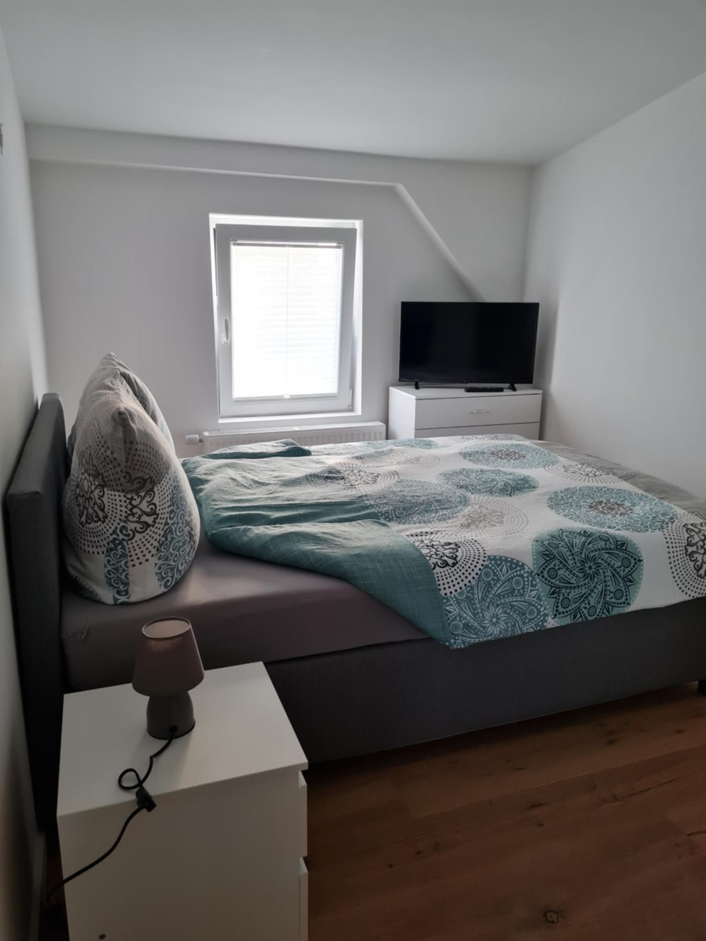 Three-Bedroom Apartment - Attic - Photo 1