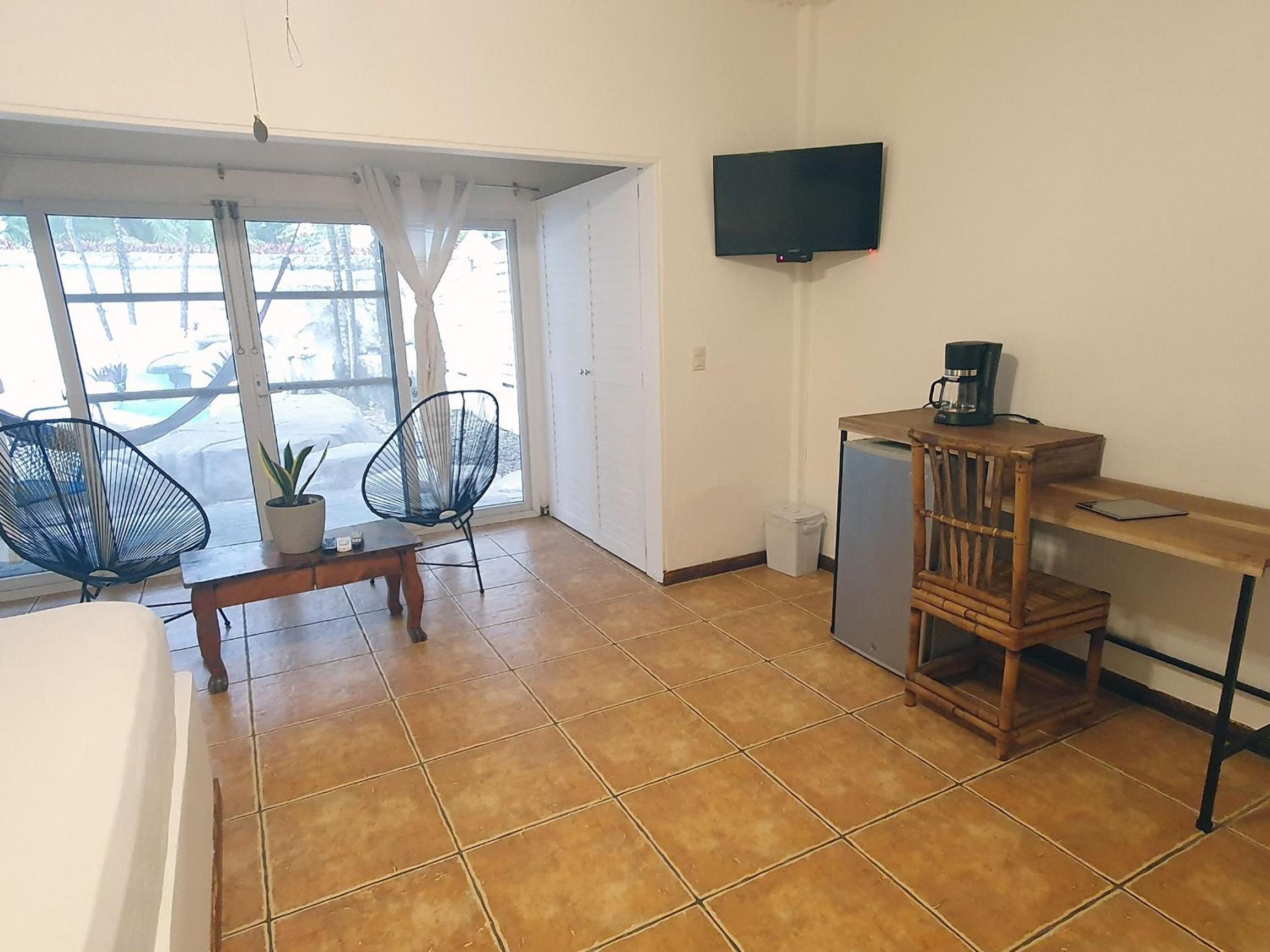 Family Room with Pool View photo 3