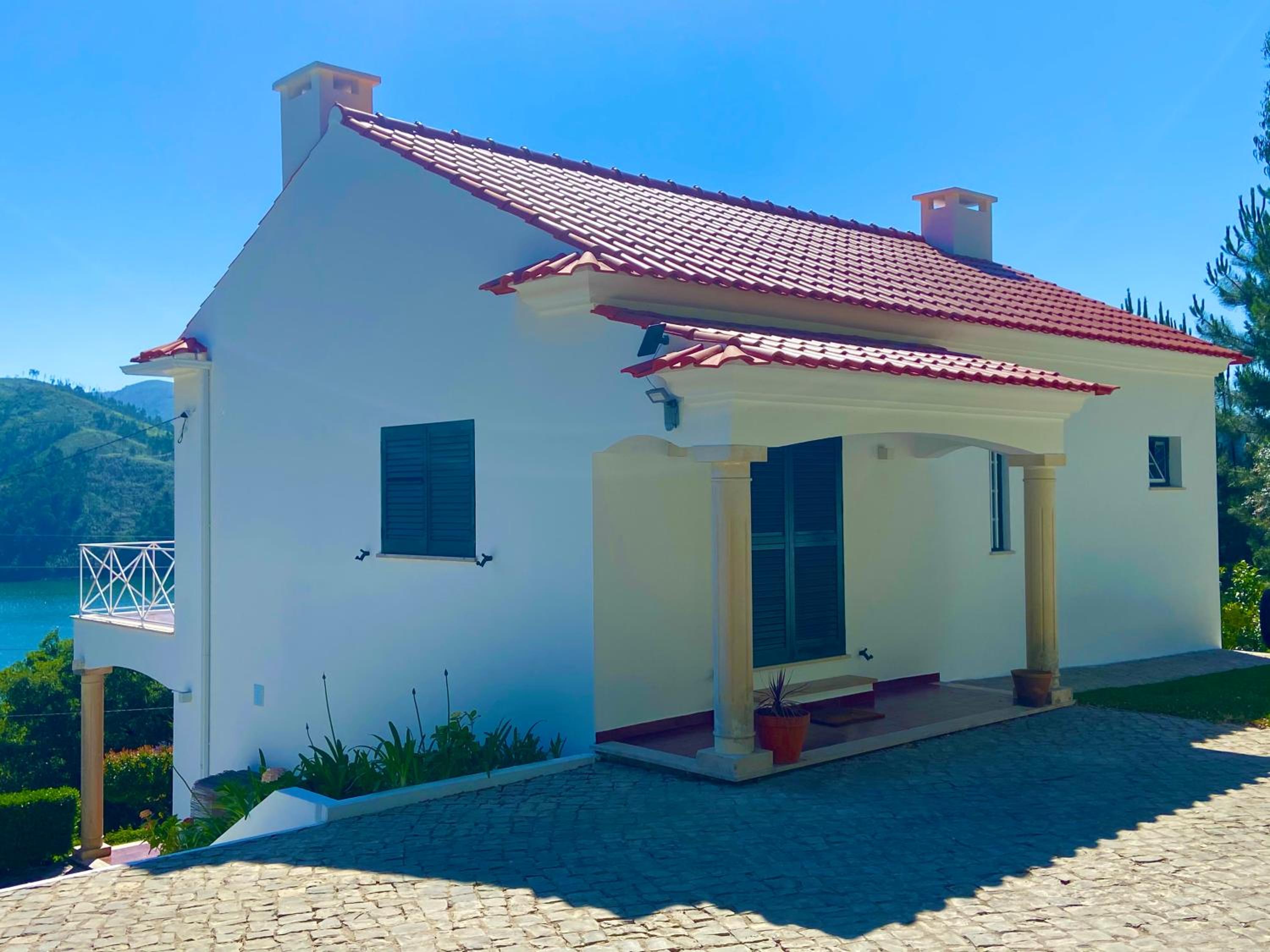 Three-Bedroom House - Photo 43