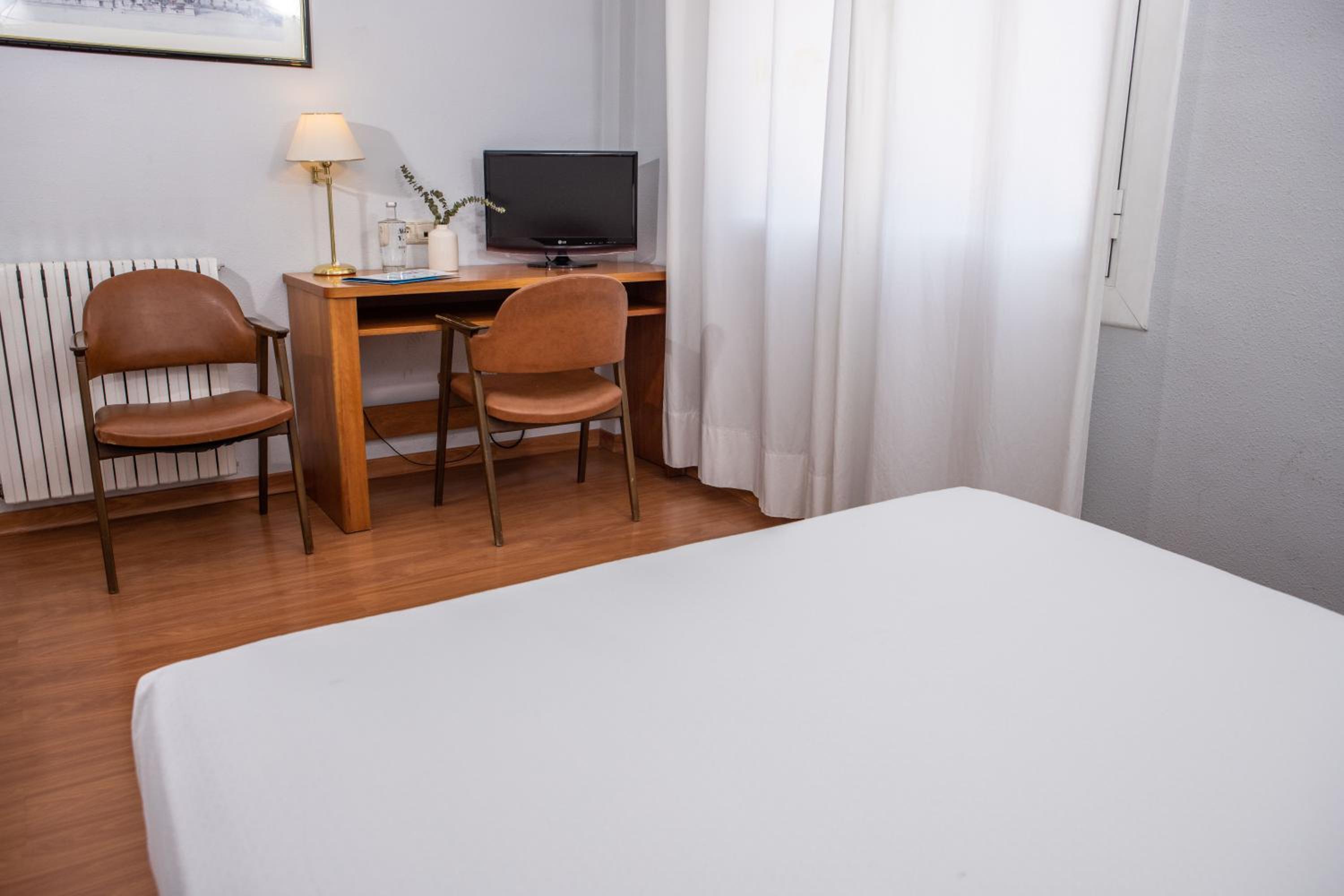 Standard Quadruple Room (3 people) photo 3