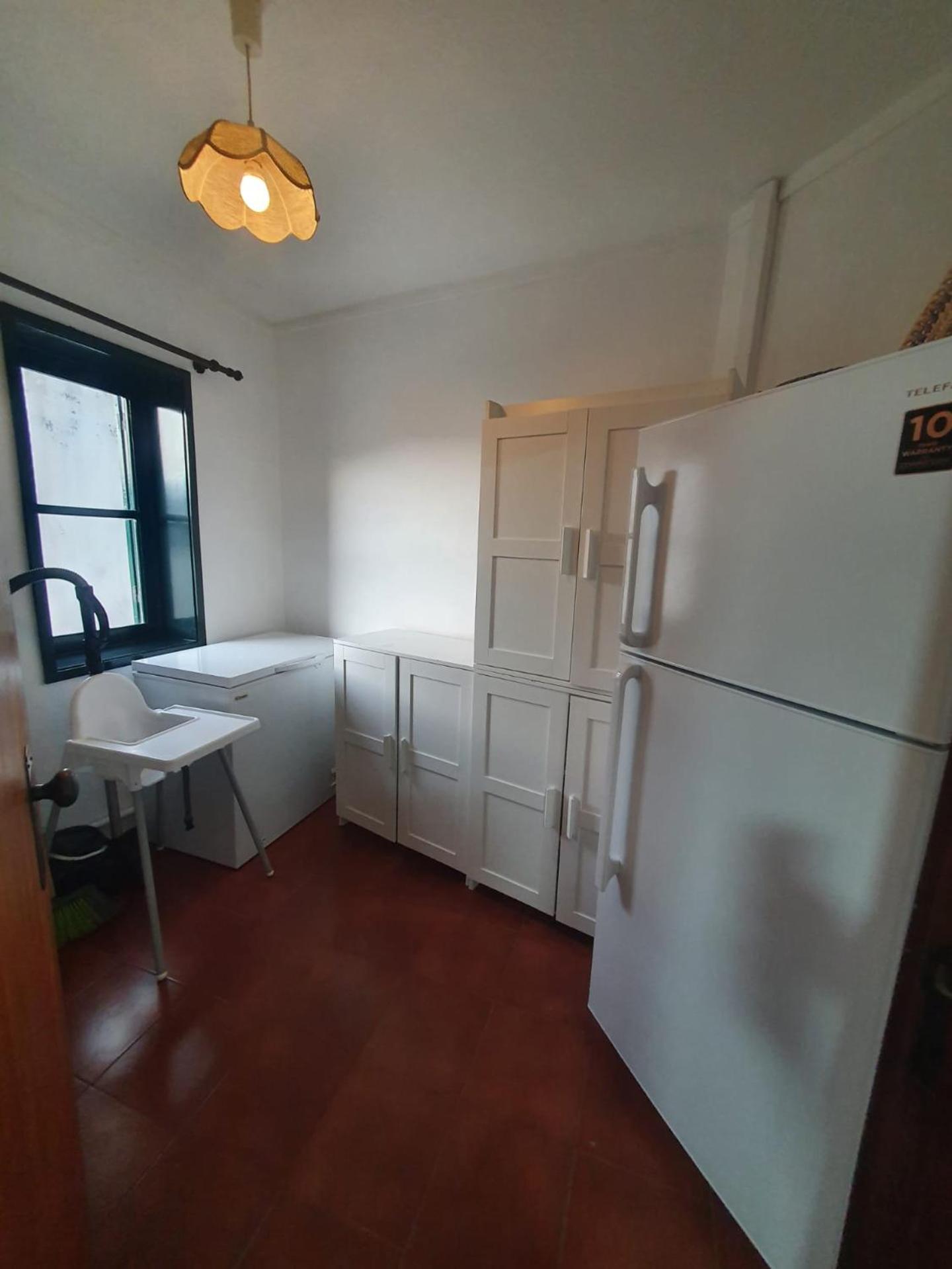 Three-Bedroom House - Photo 40
