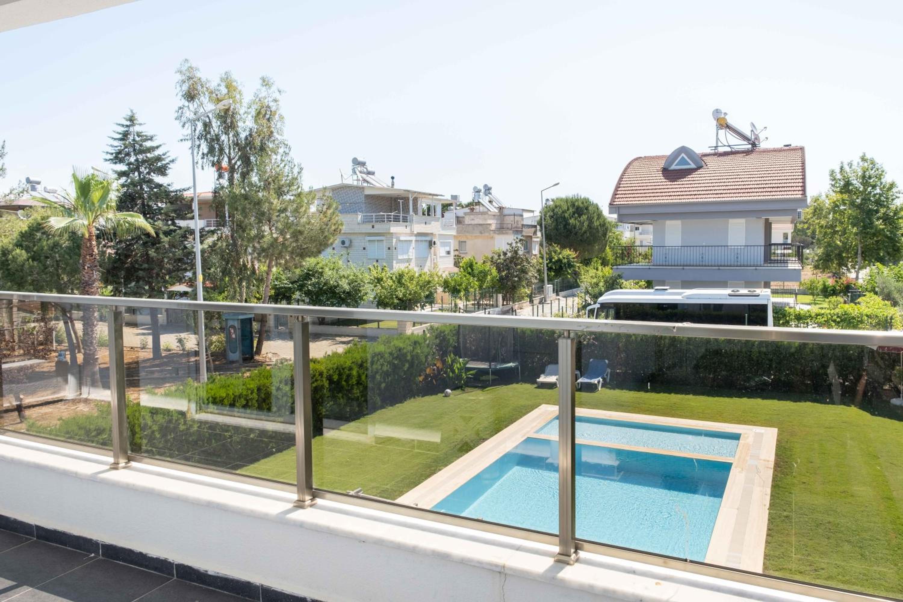 Three-Bedroom Apartment with Pool View