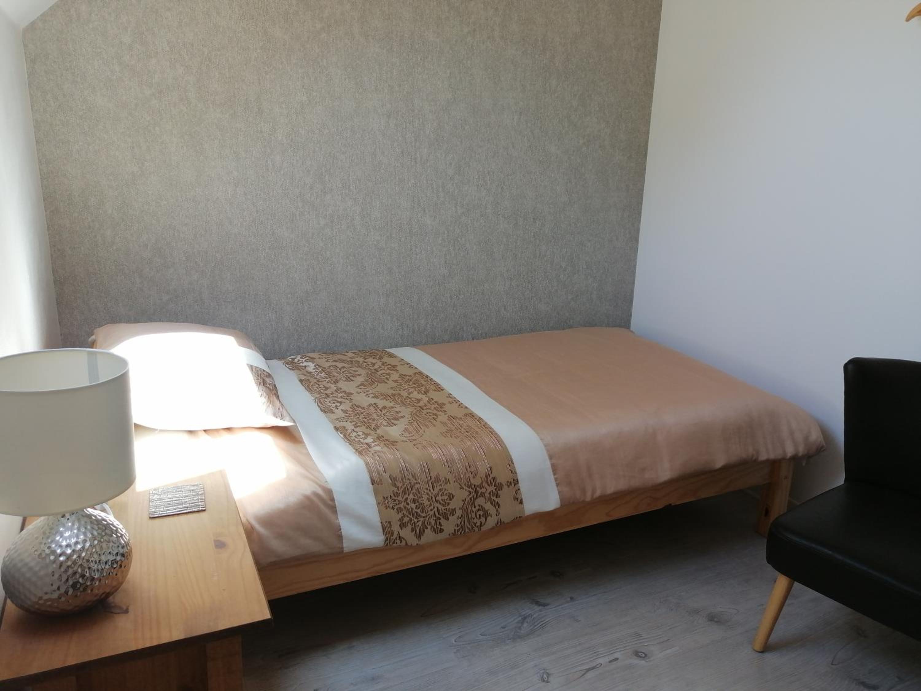Three-Bedroom Apartment photo 2
