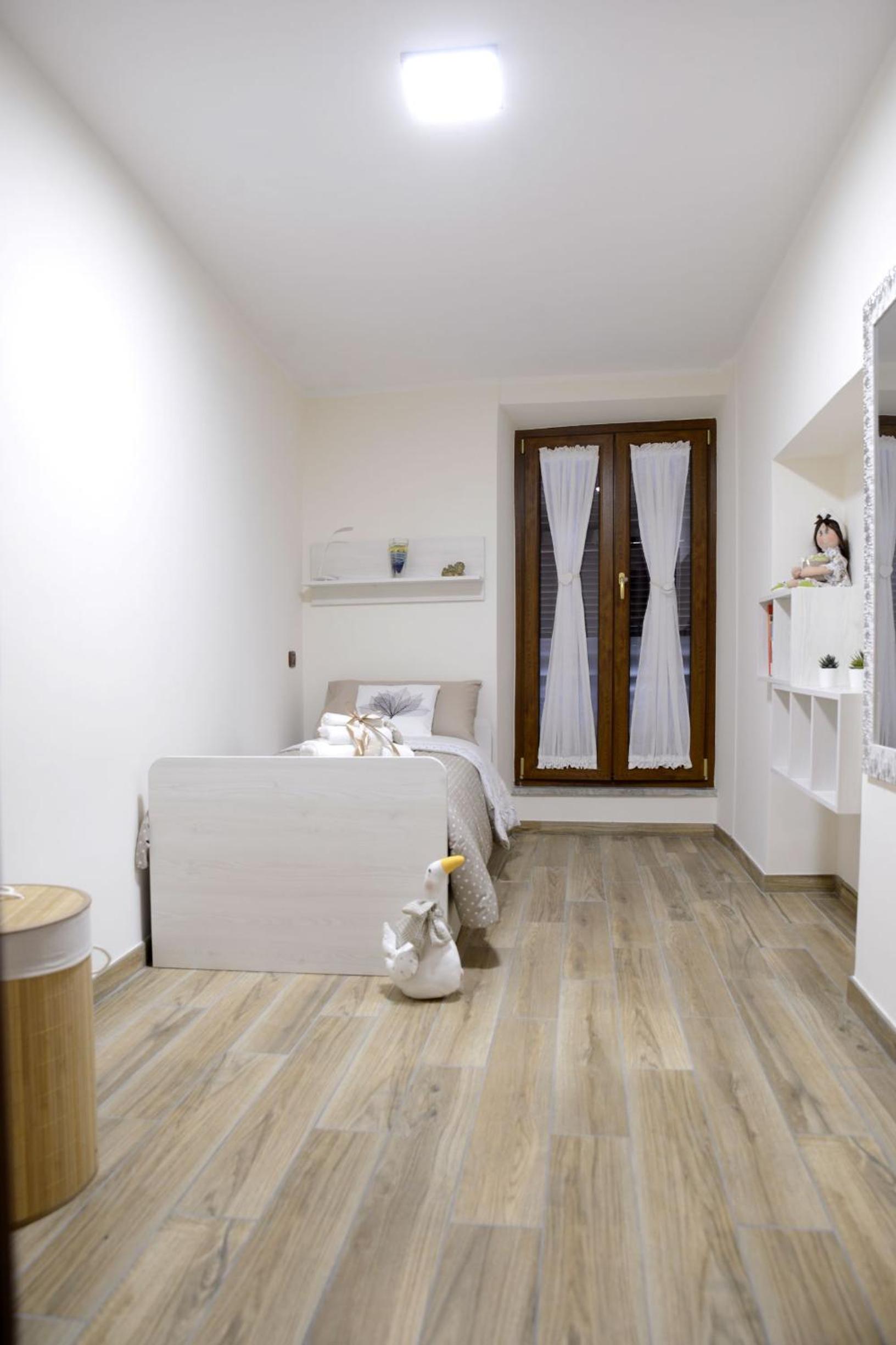 Two-Bedroom Apartment - Photo 18