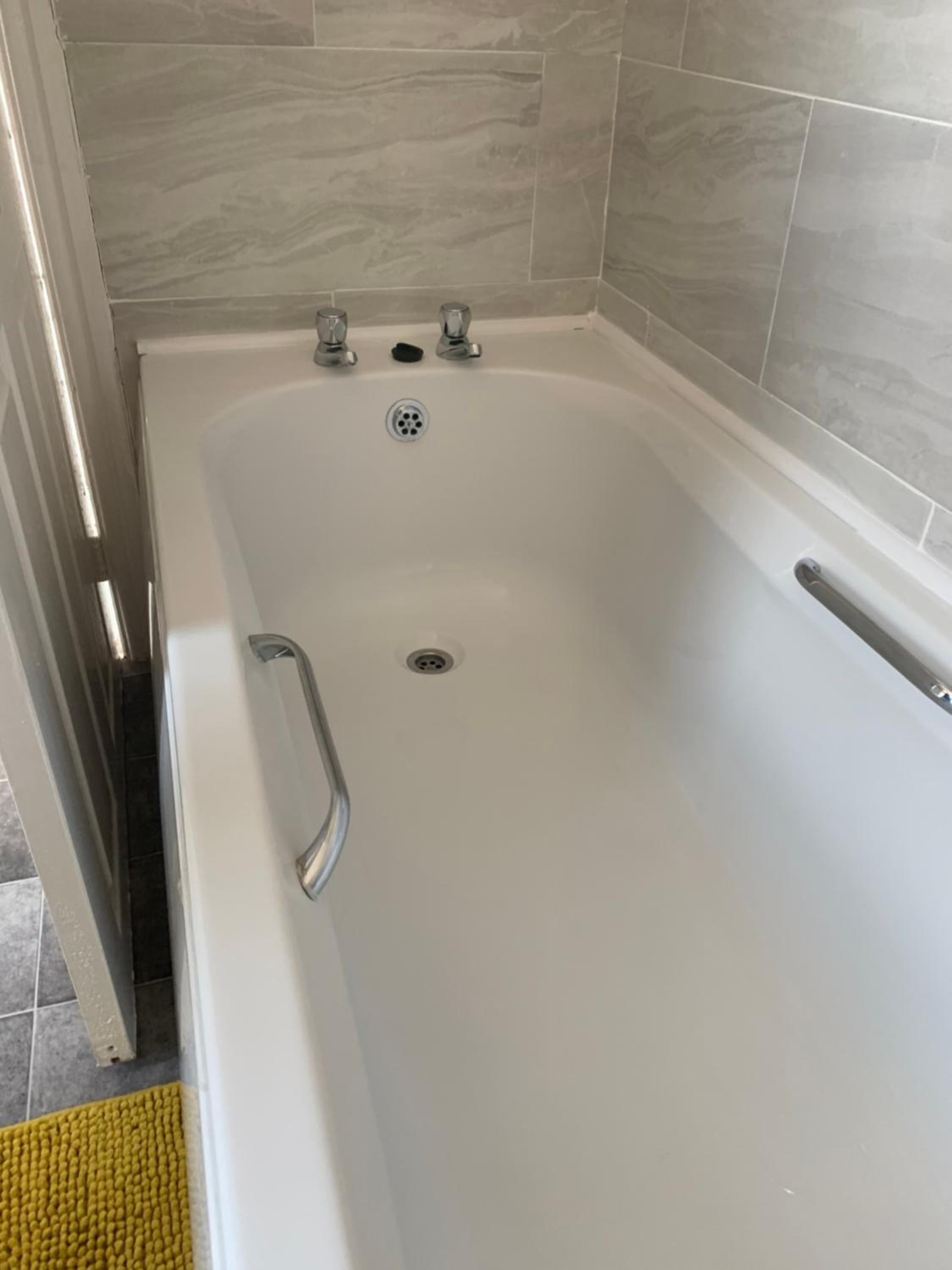 Three-Bedroom House - Photo 24