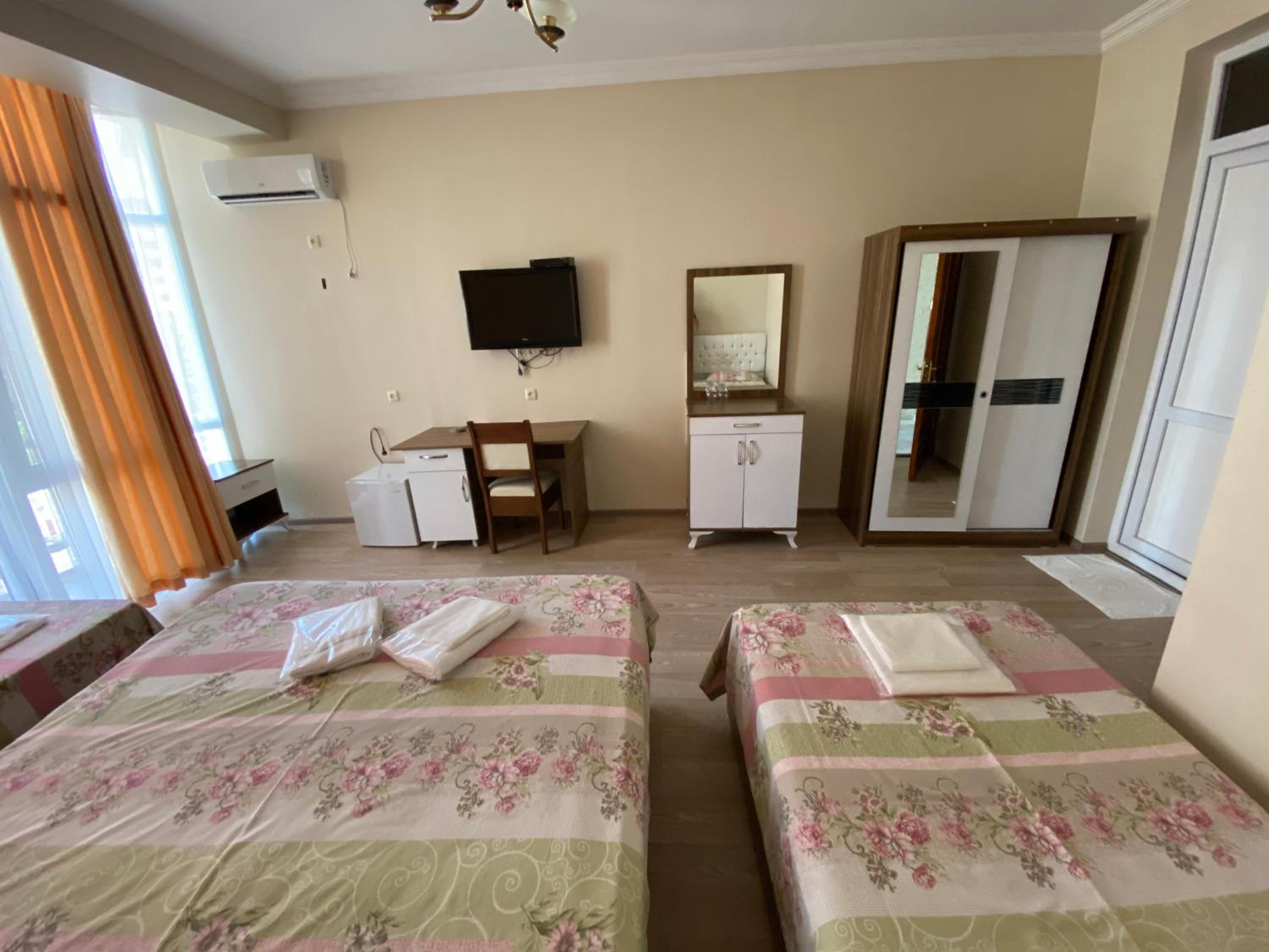 Quadruple Room with Balcony