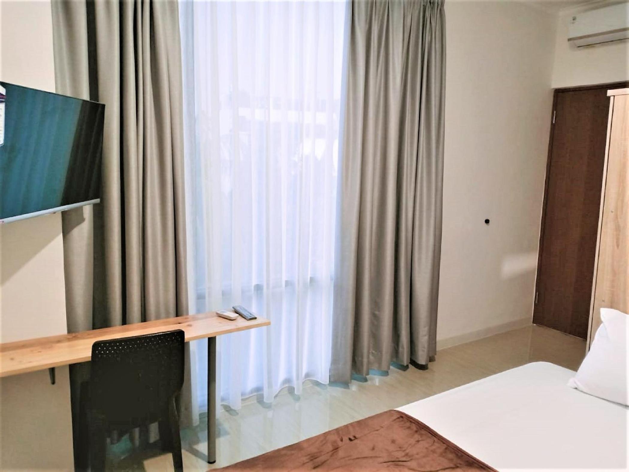 Deluxe Double Room - Photo 8