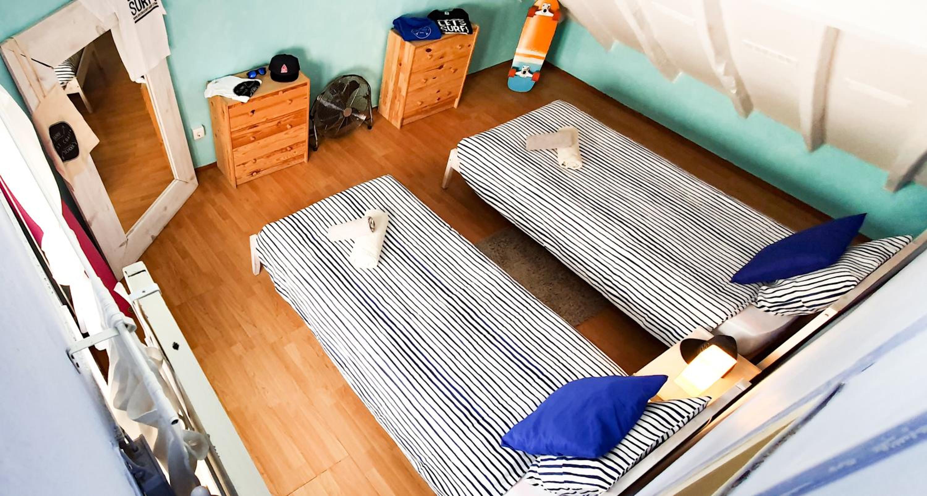 Single Bed in Dormitory Room