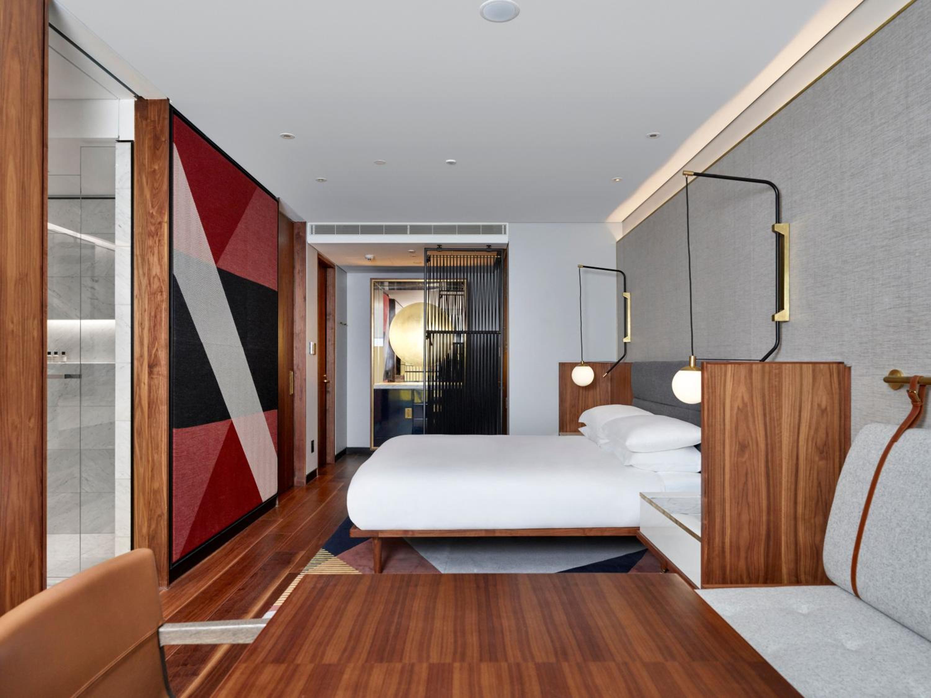 hotel room with a bed and a couch in it