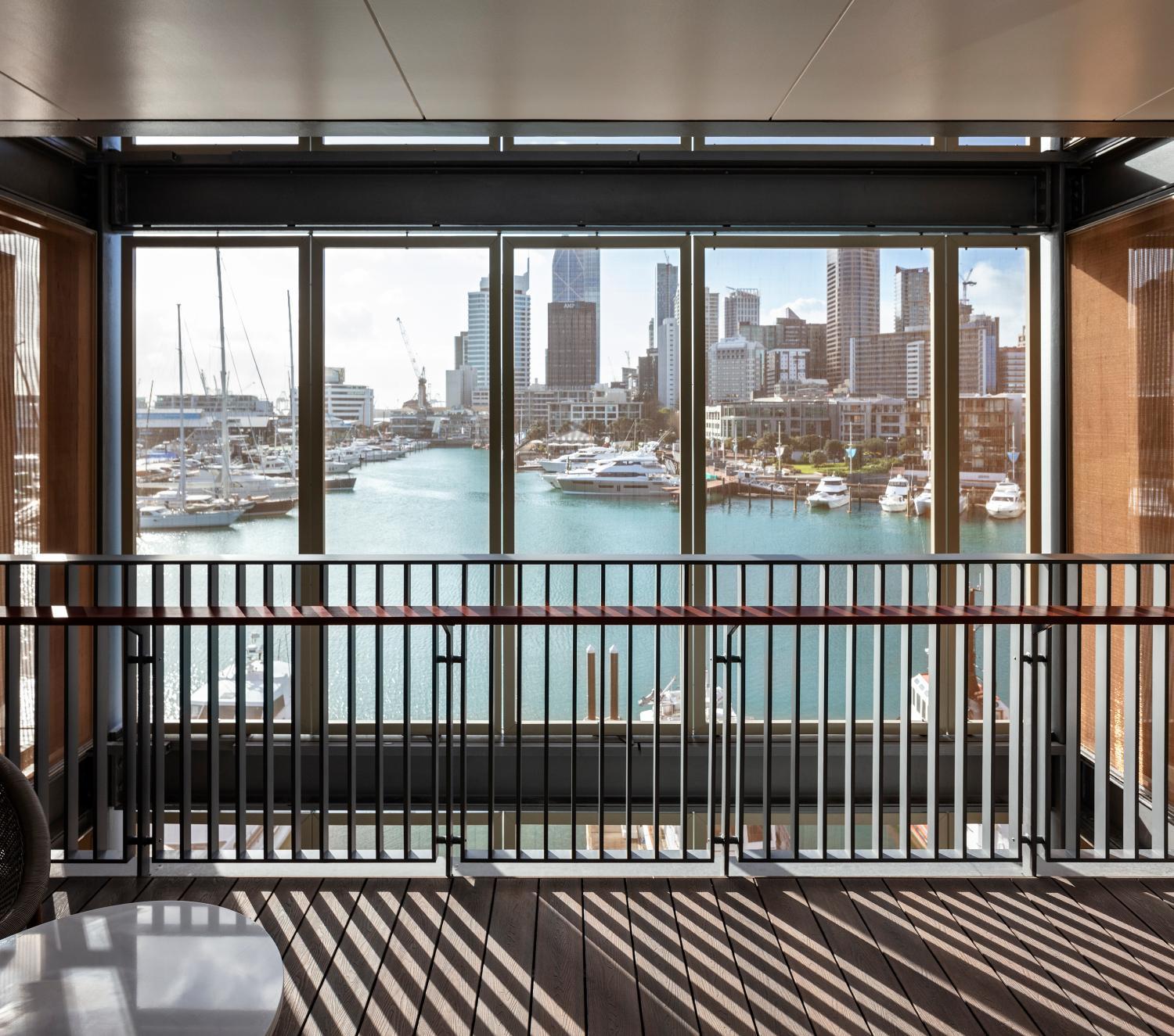 balcony with a view of the city and harbor?