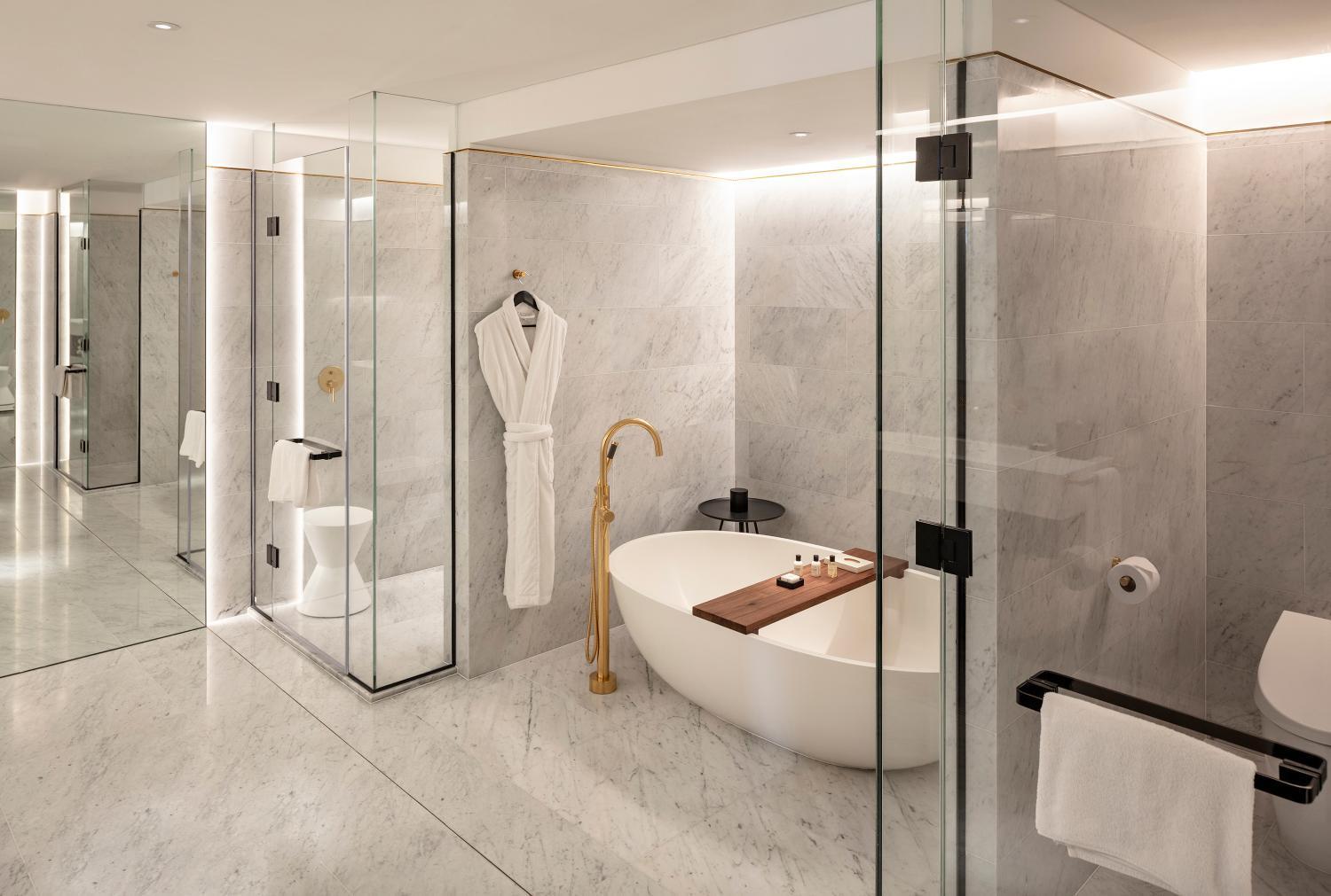 bathroom with a bathtub in the middle of the room